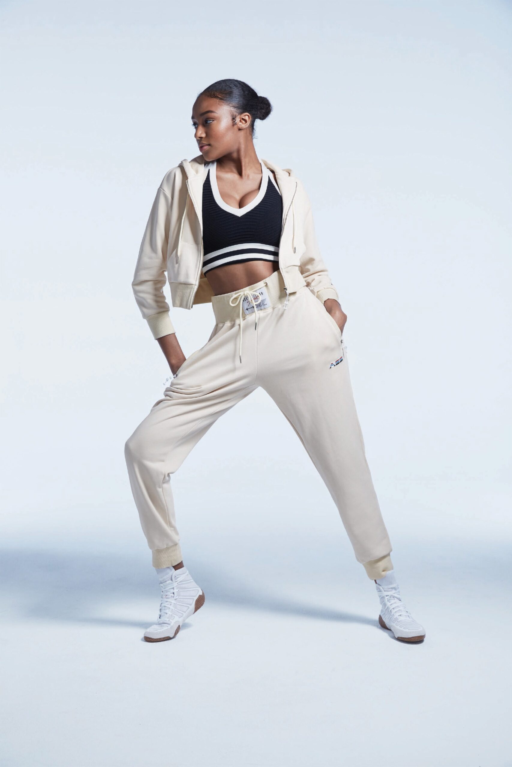 beige hoodie black crop-top beige pants