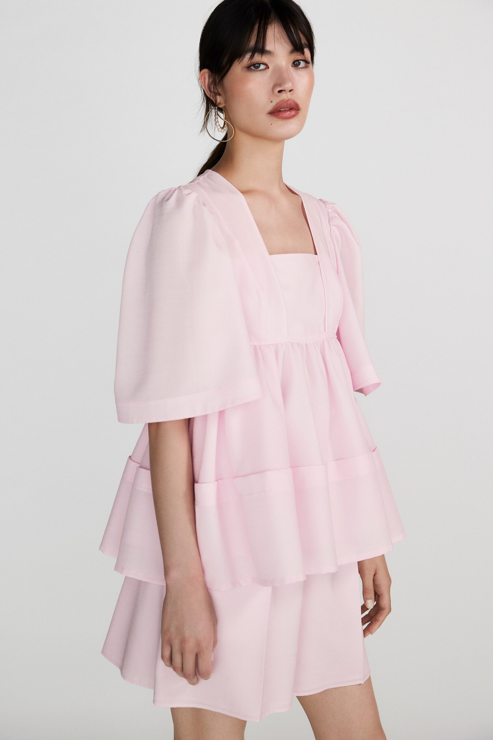 pink chiffon sleeveless relaxed layered cape