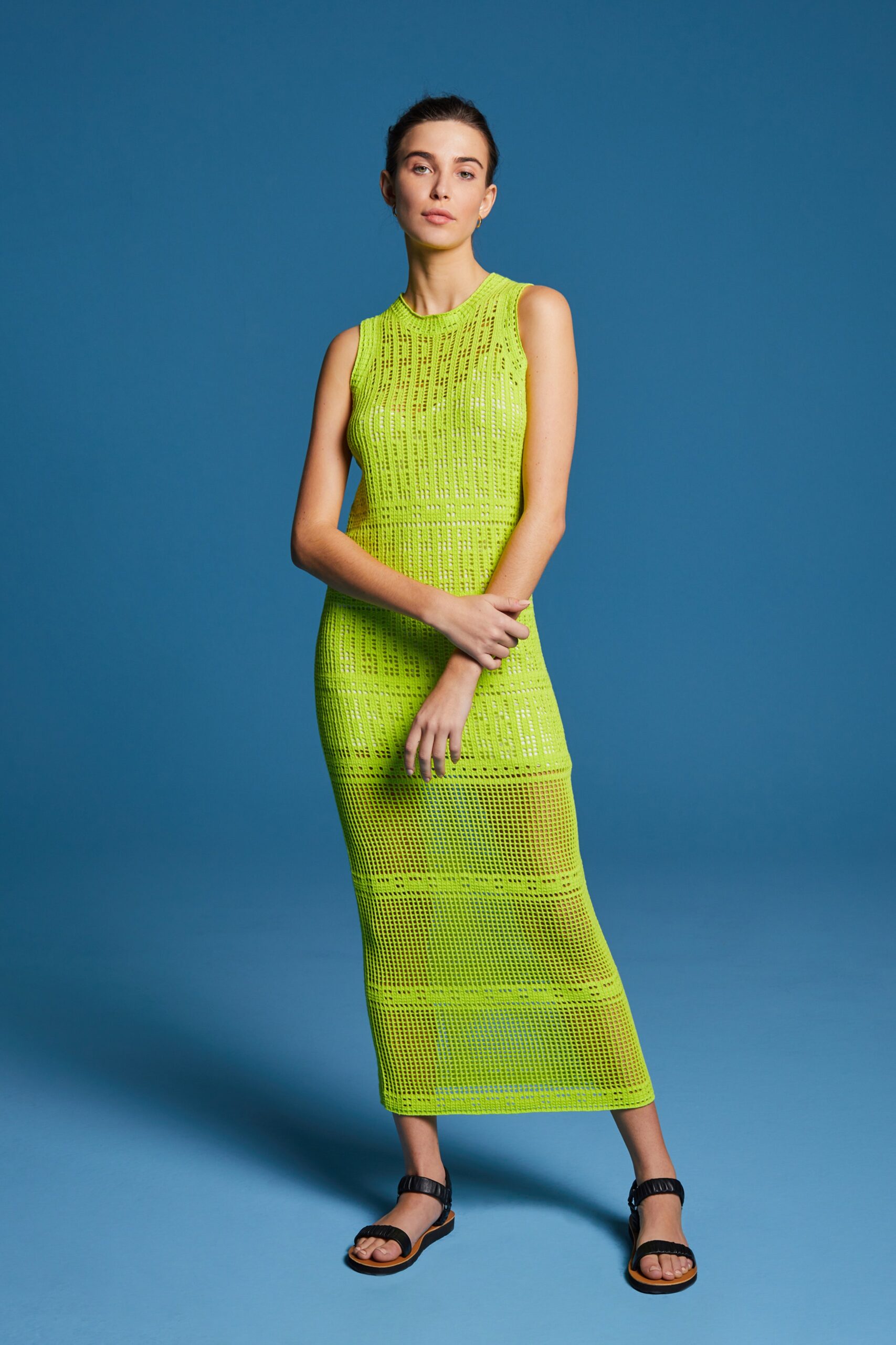fitted green sleeveless dress