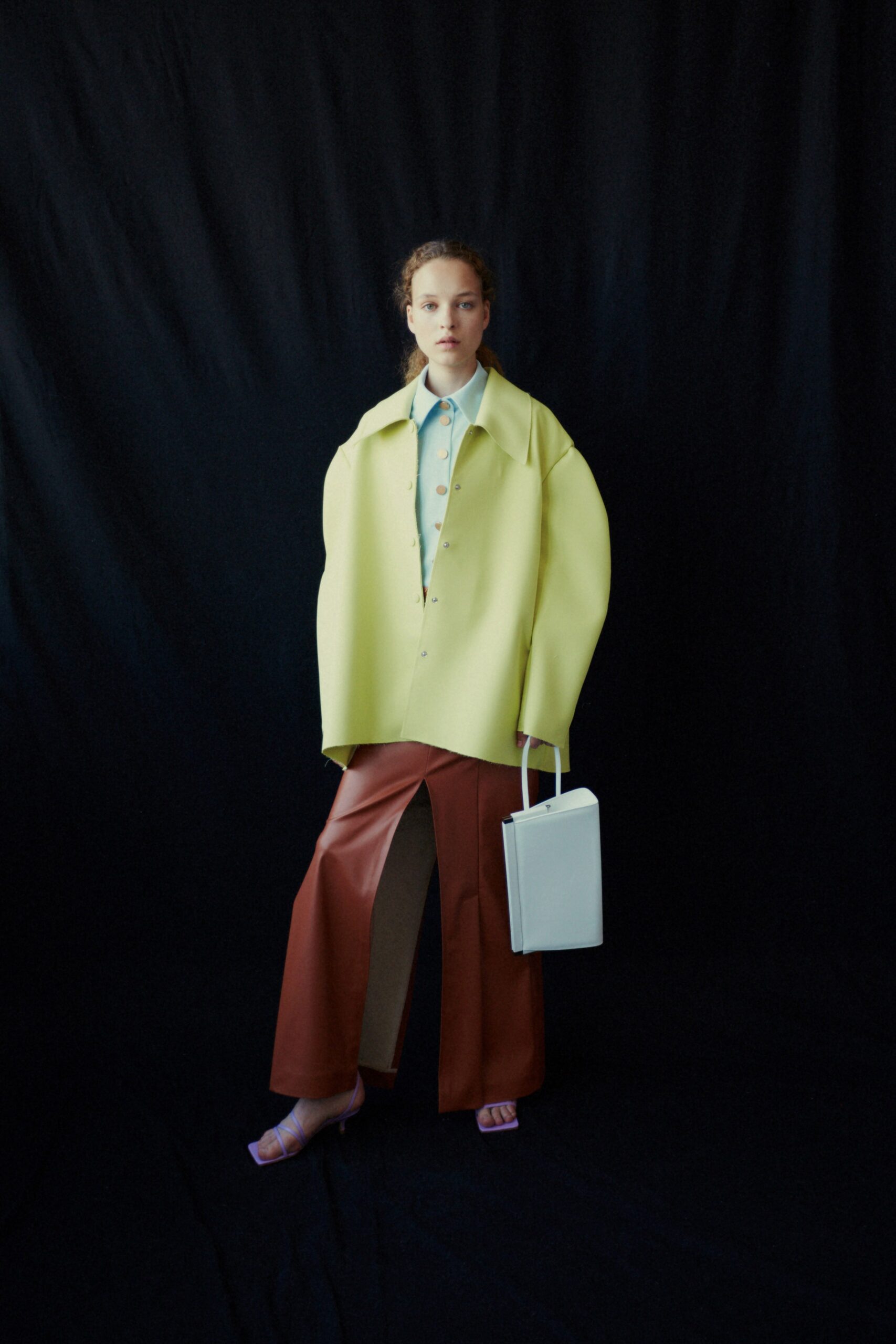 oversized yellow vinyl coat