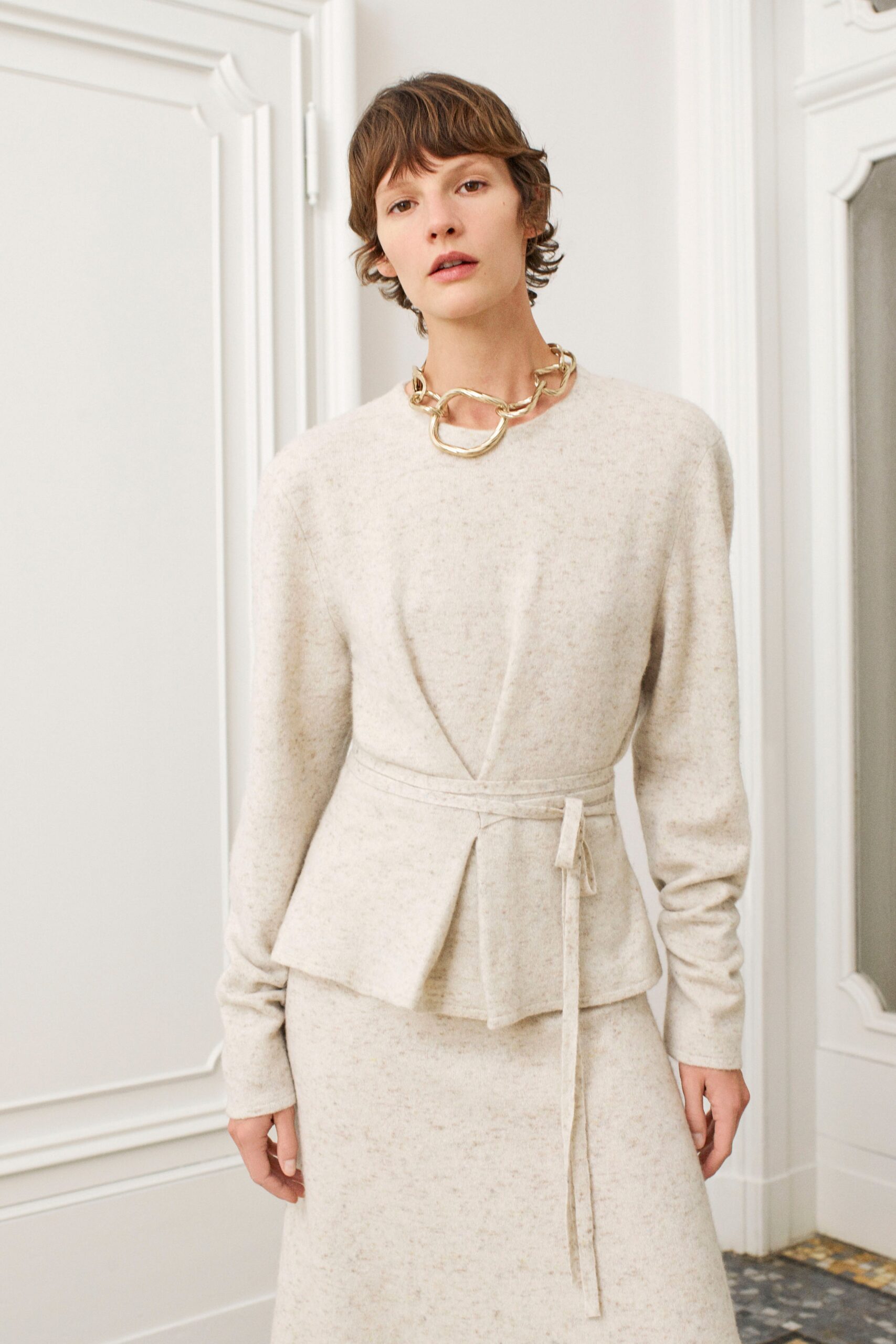 beige wool long-sleeve v-neck fitted pleated top