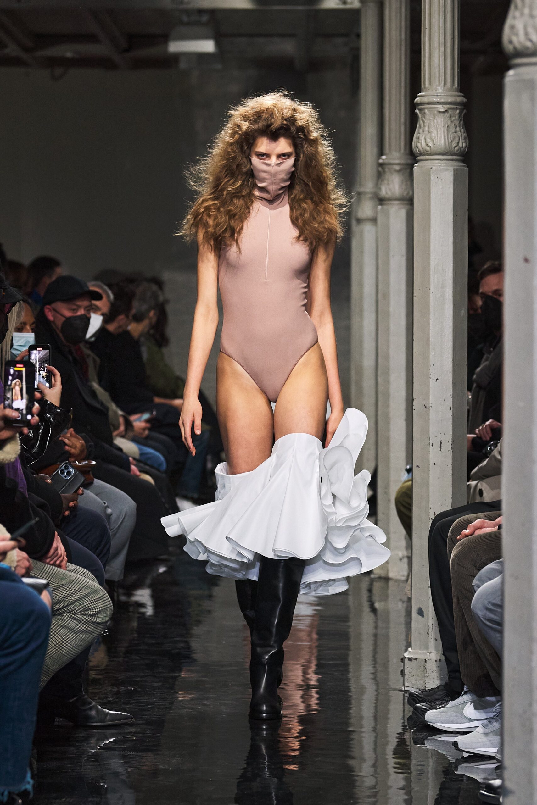 beige bodysuit with white asymmetric skirt