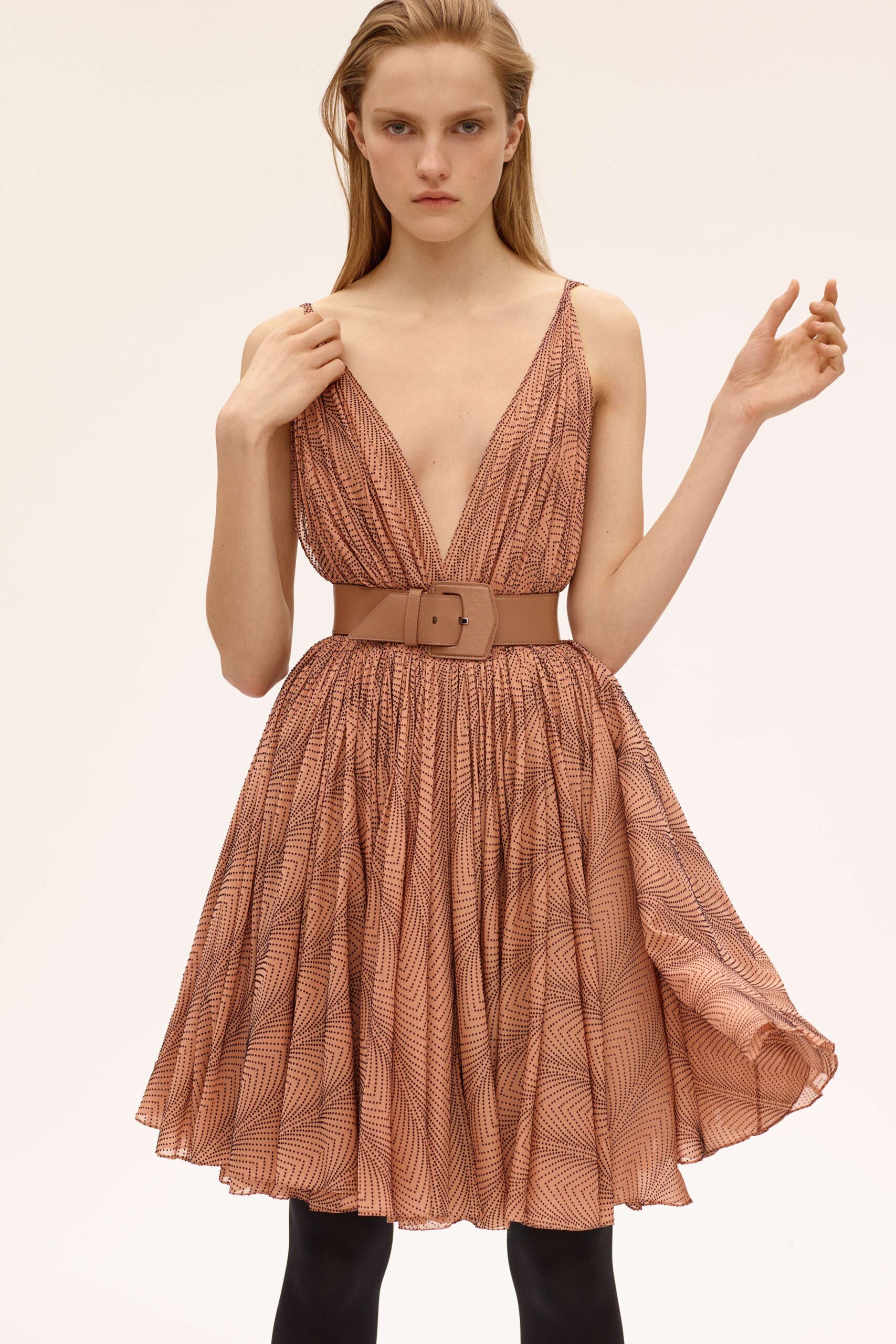 orange and brown pleated dress