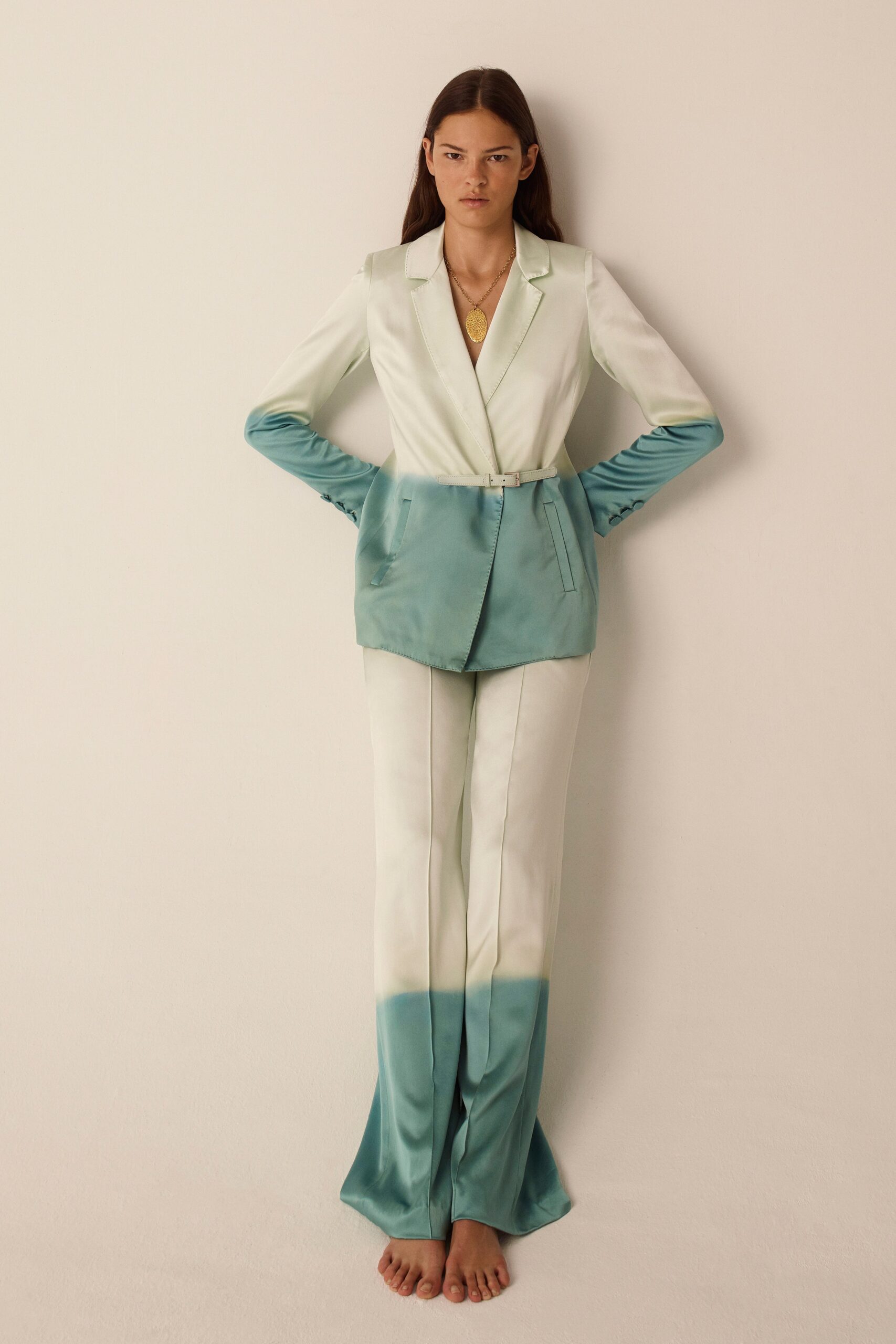 white and teal silk suit