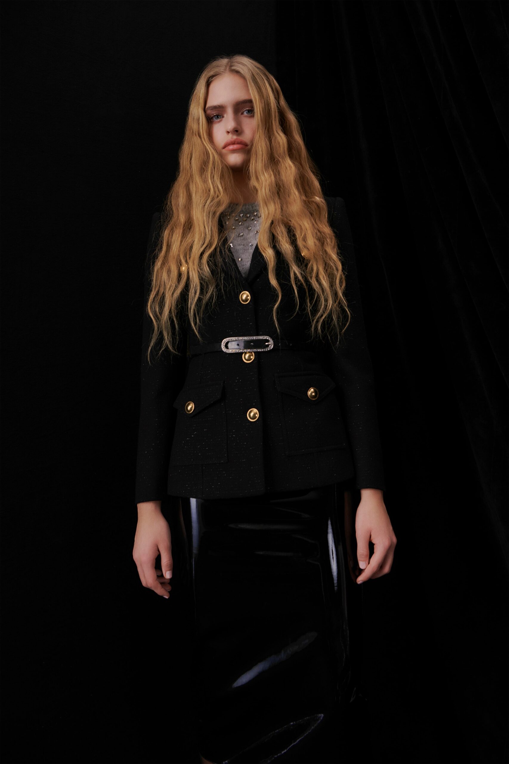 black tailored blazer and shiny skirt