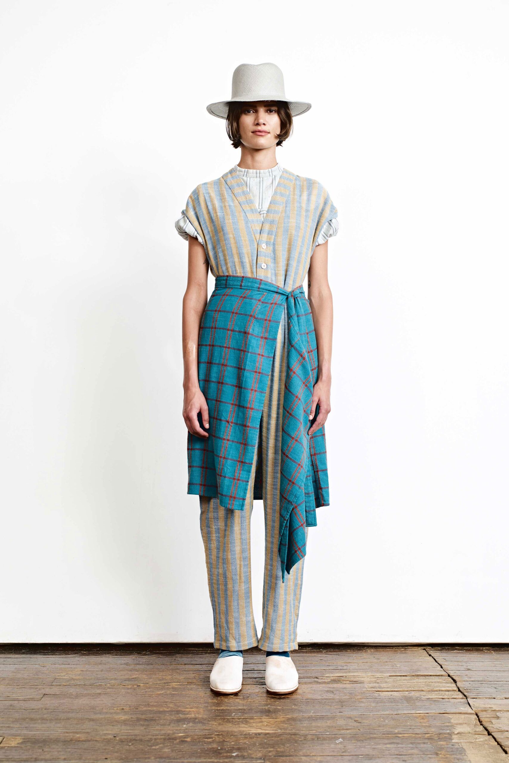 relaxed white top with checked pants