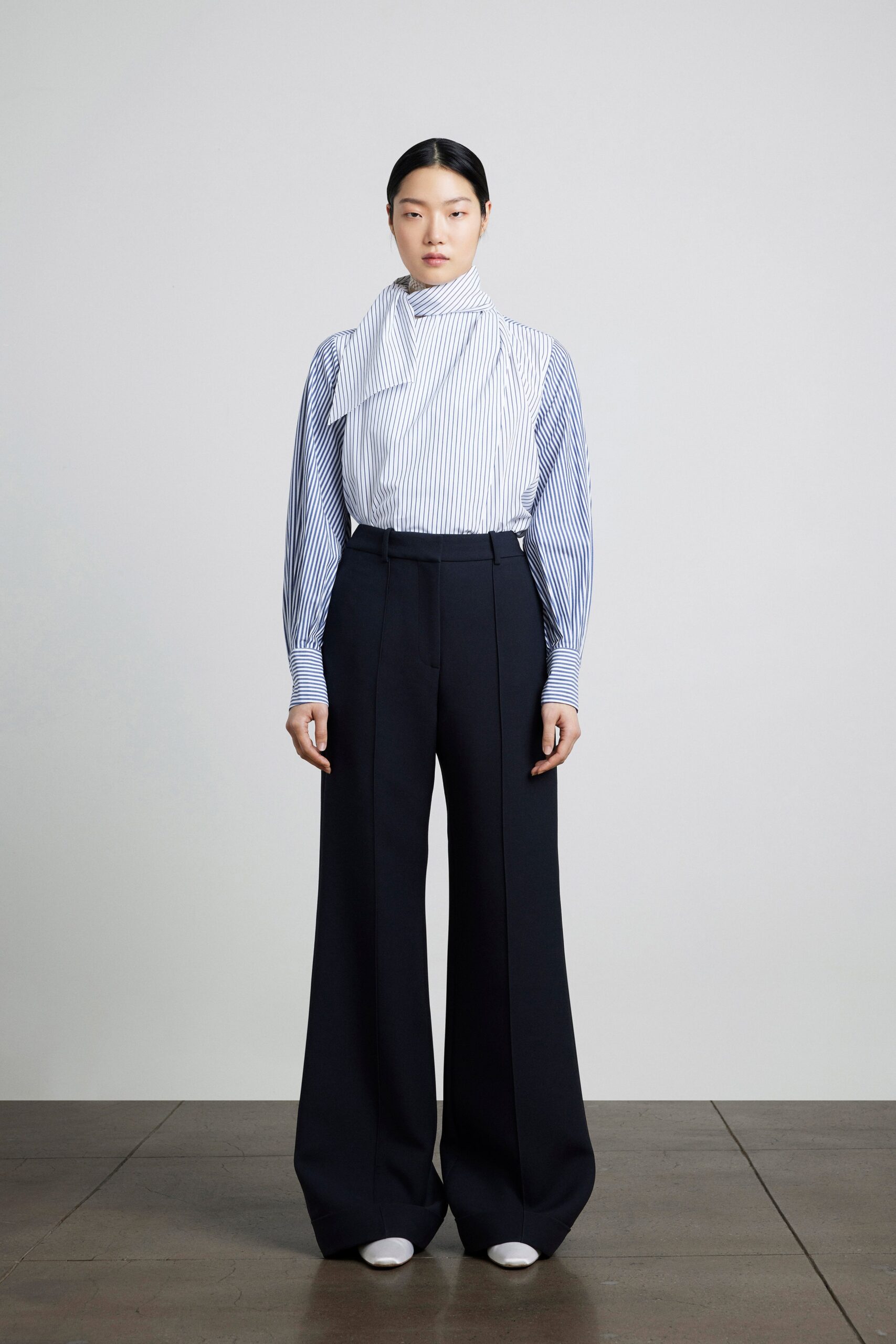 striped shirt and tailored pants