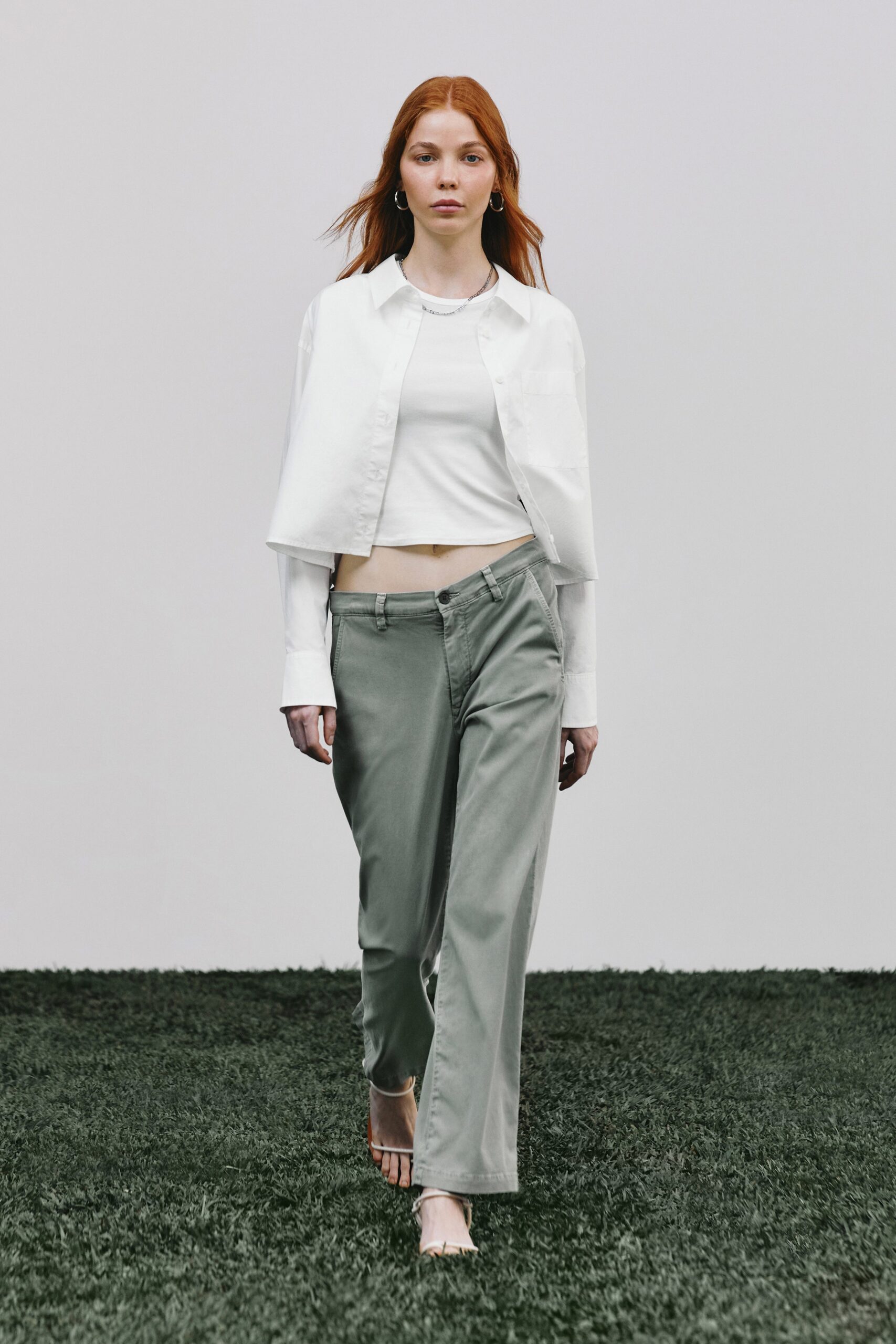 white cotton shirt and green pants