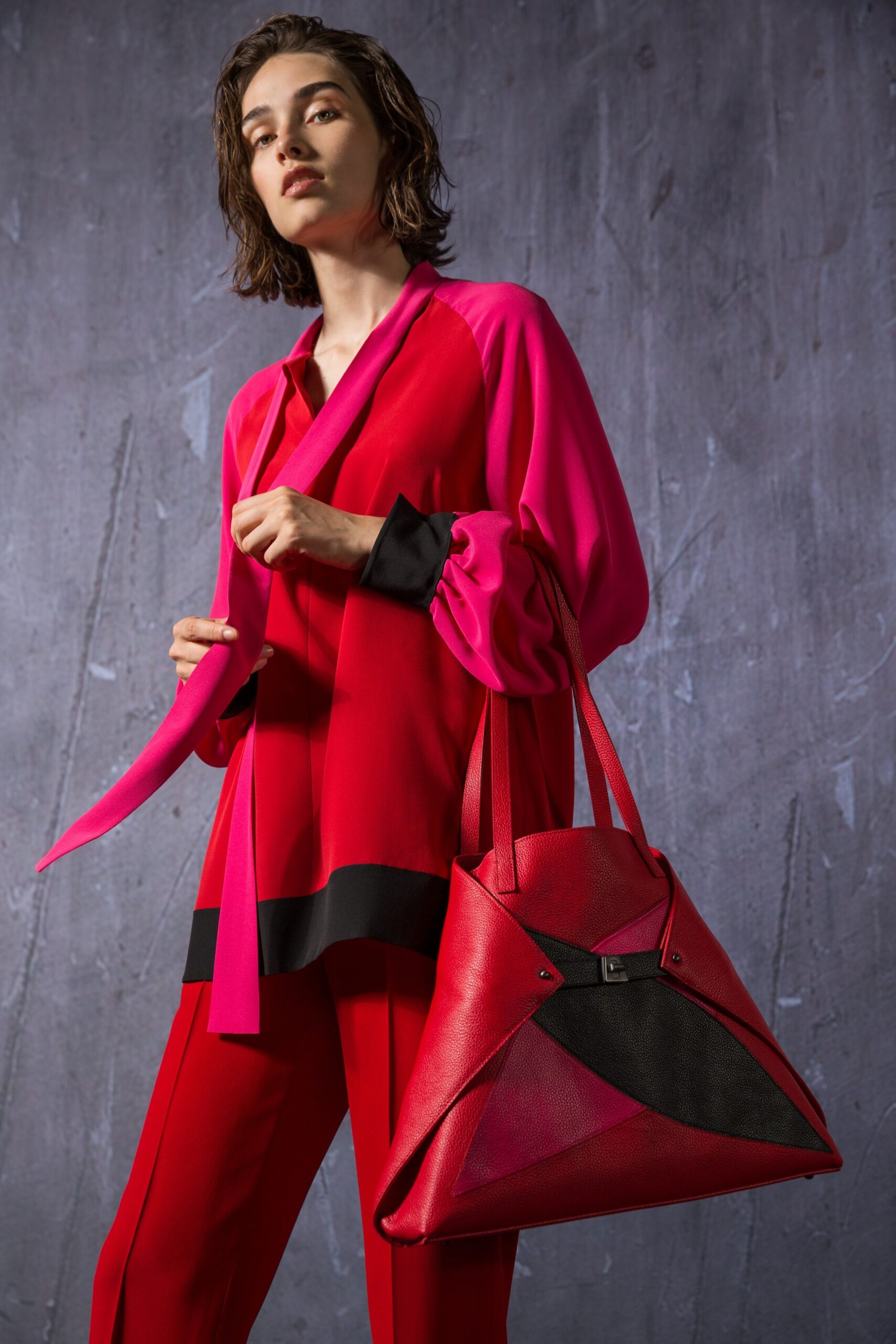 red long-sleeve collared fitted layered top