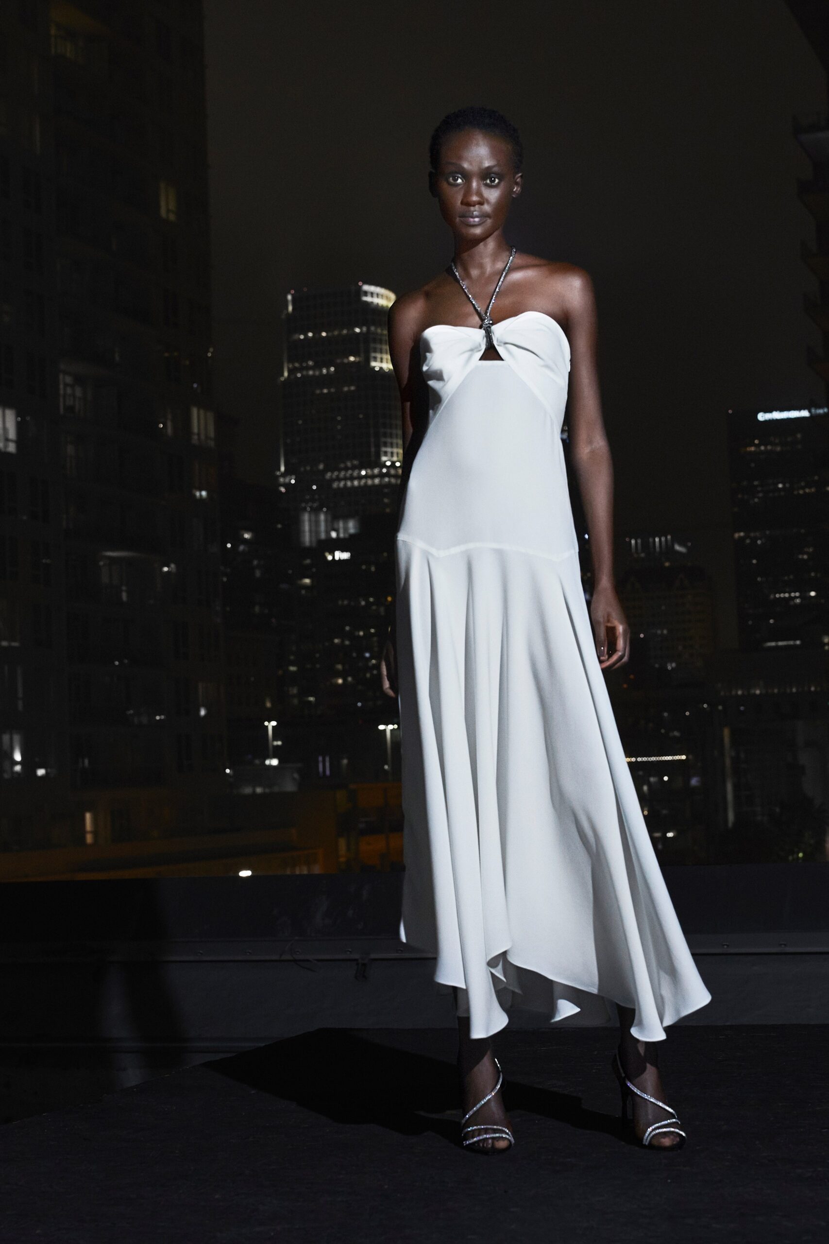 white silk strapless asymmetric dress