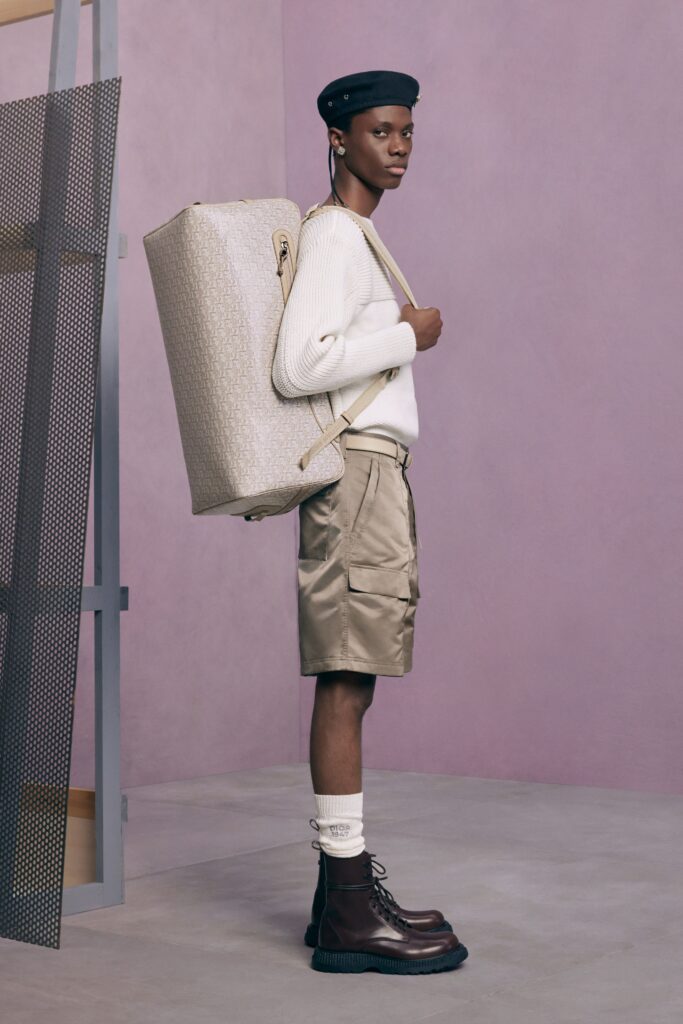 white fitted sweater and beige shorts