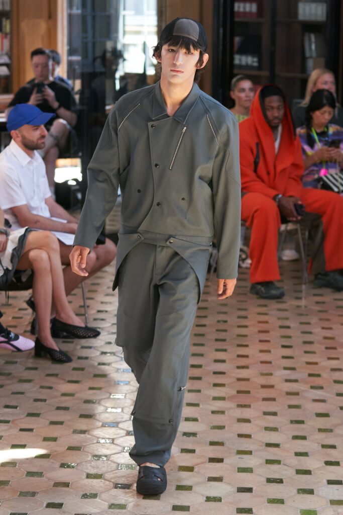 A relaxed gray cotton jacket with long sleeves and matching pants, featuring a collared design.