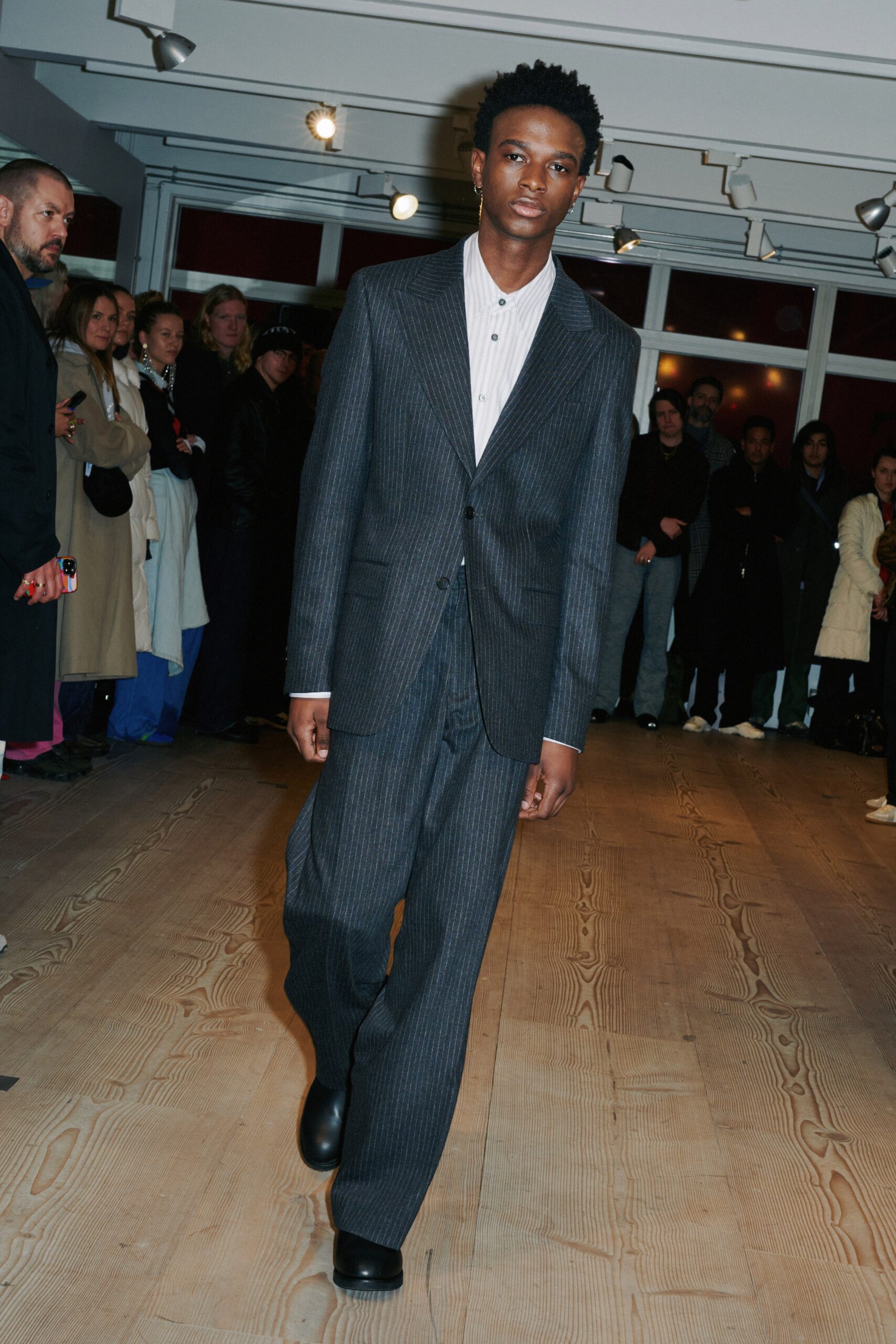 gray striped tailored suit with white shirt