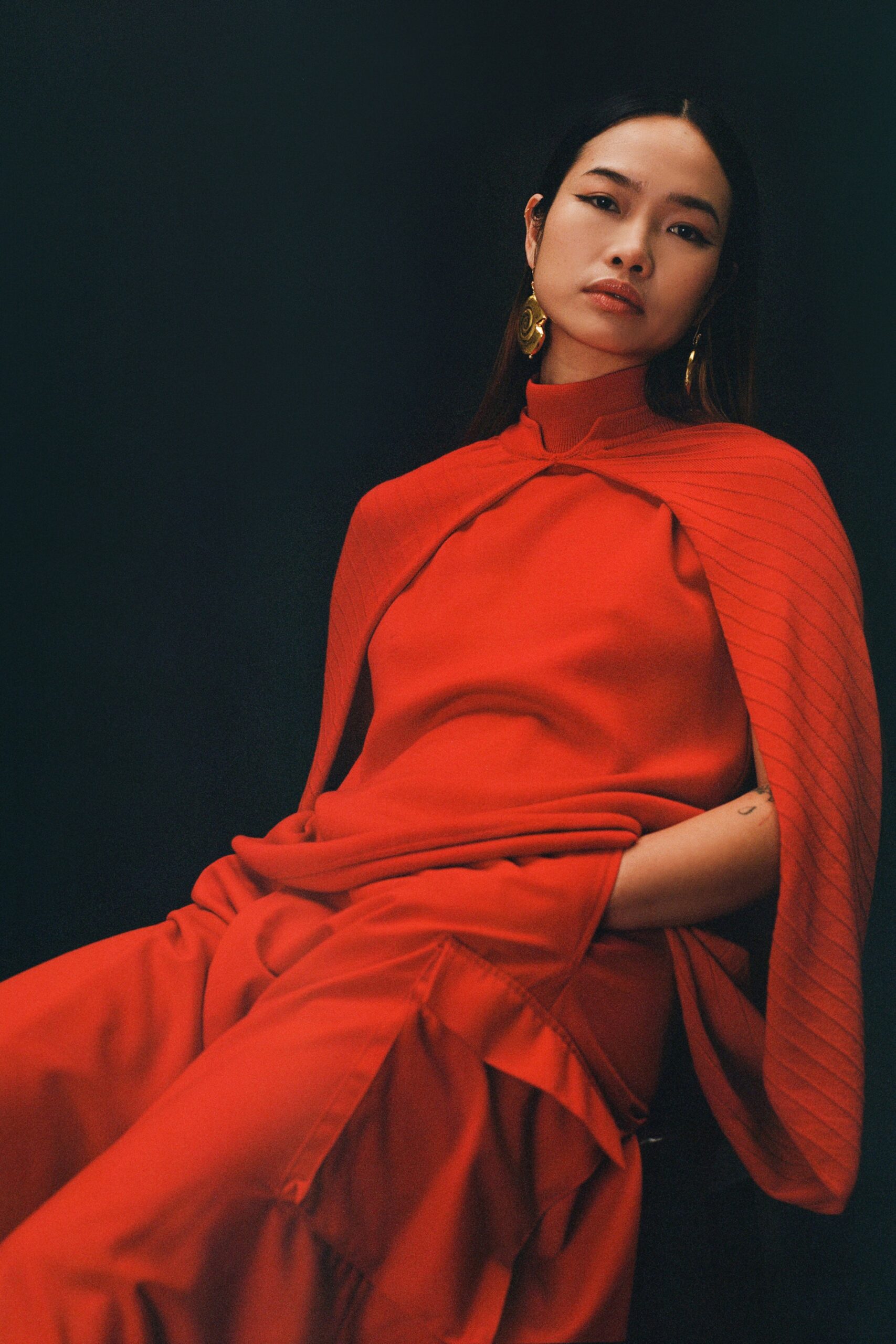 red relaxed top with cargo pants