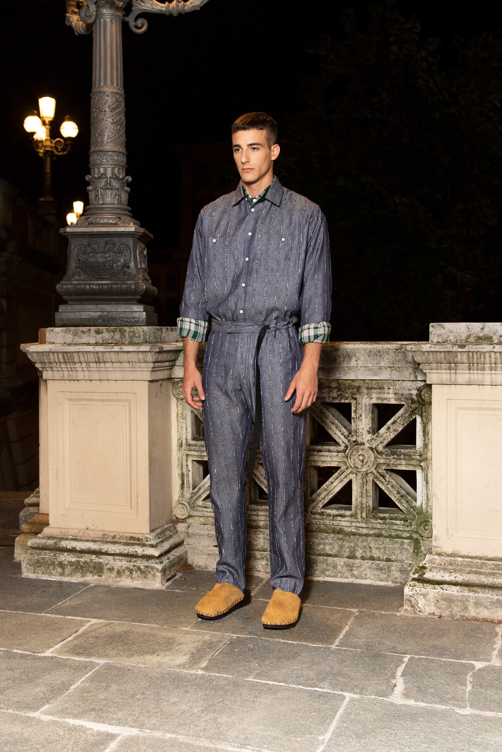 A relaxed fit blue striped shirt with long sleeves paired with matching pants.