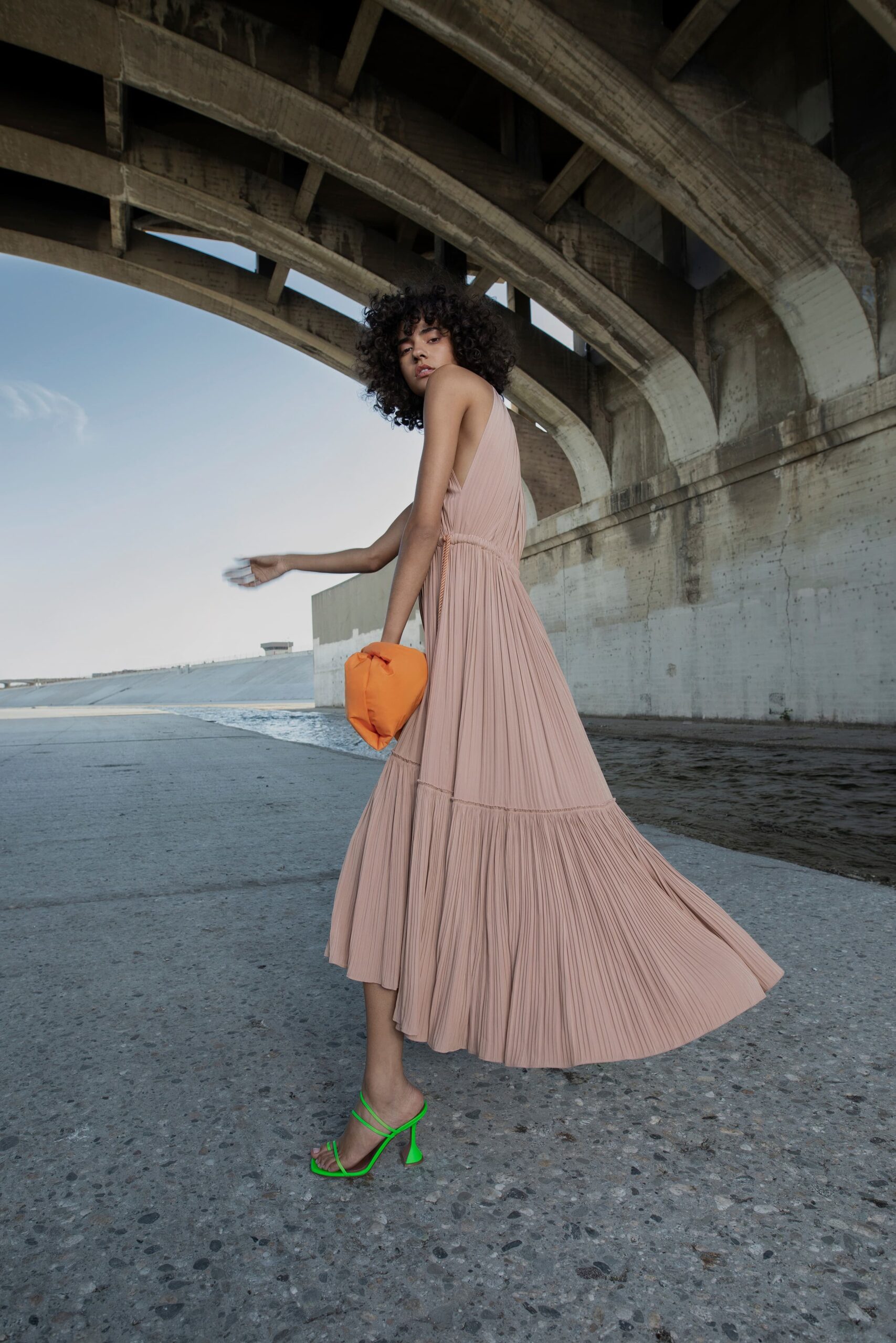 pink silk sleeveless v-neck fitted pleated tiered dress