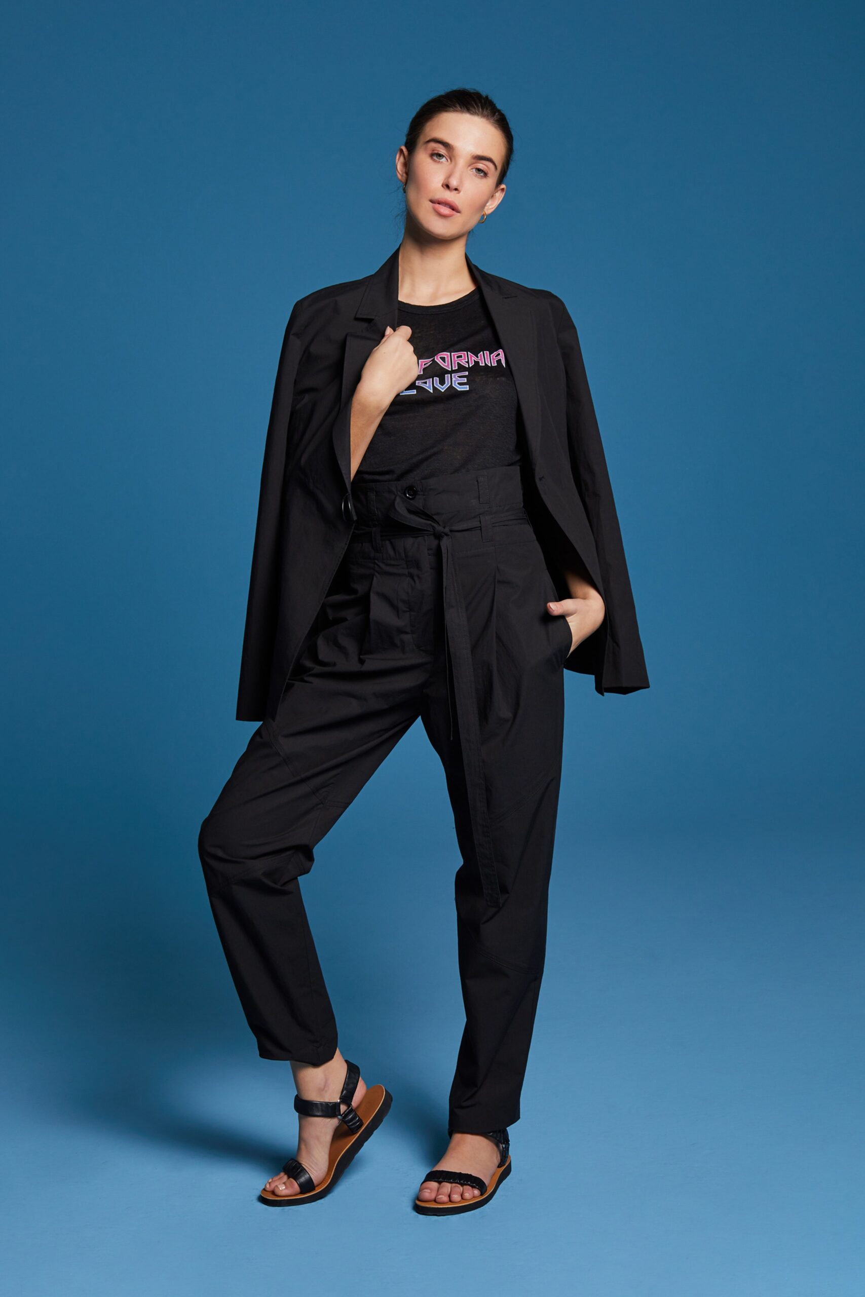 black tailored blazer with relaxed pants