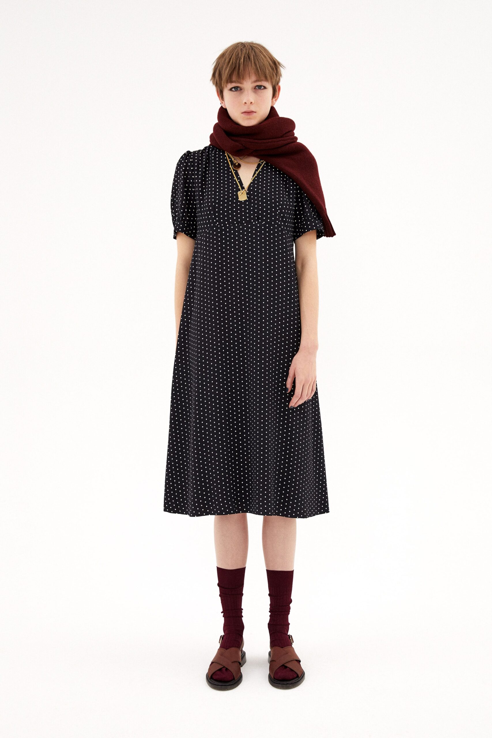 black and white printed midi dress with maroon scarf