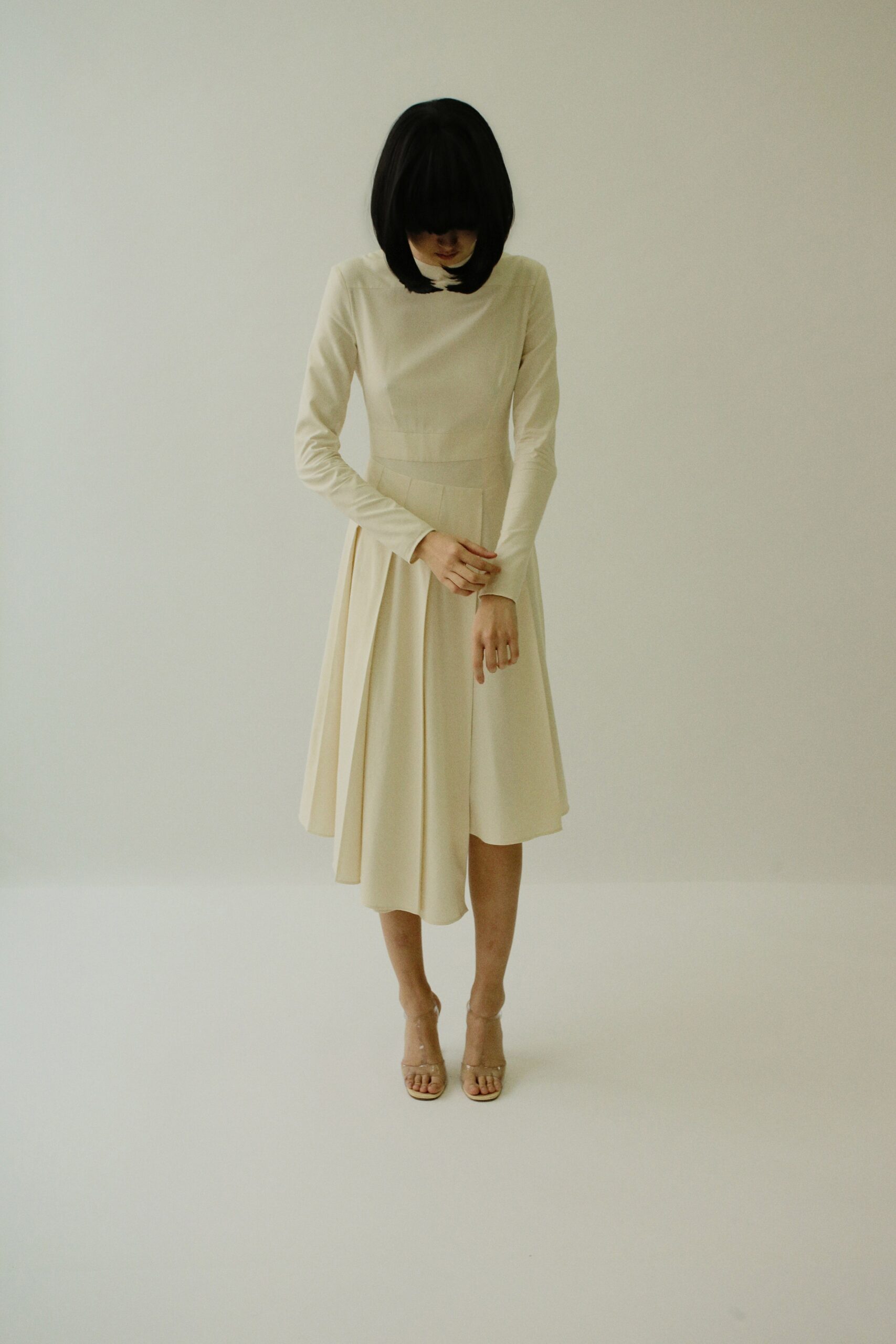 beige fitted long-sleeve dress