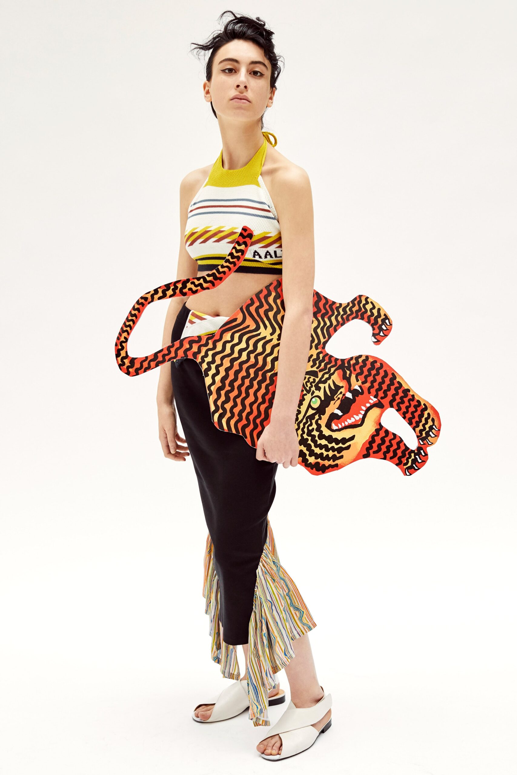 multi-colored halter top and black skirt