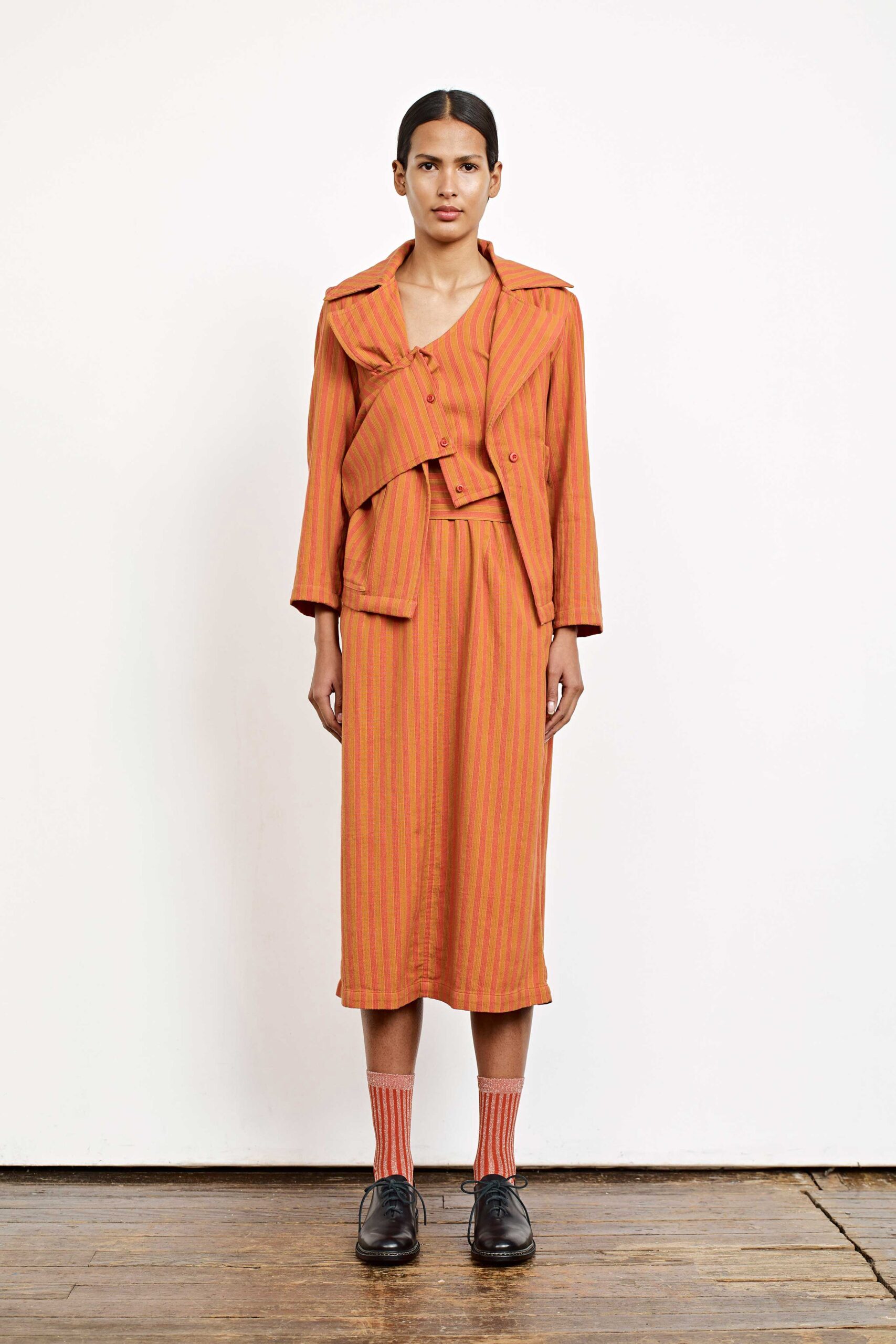 orange and red striped jacket and dress