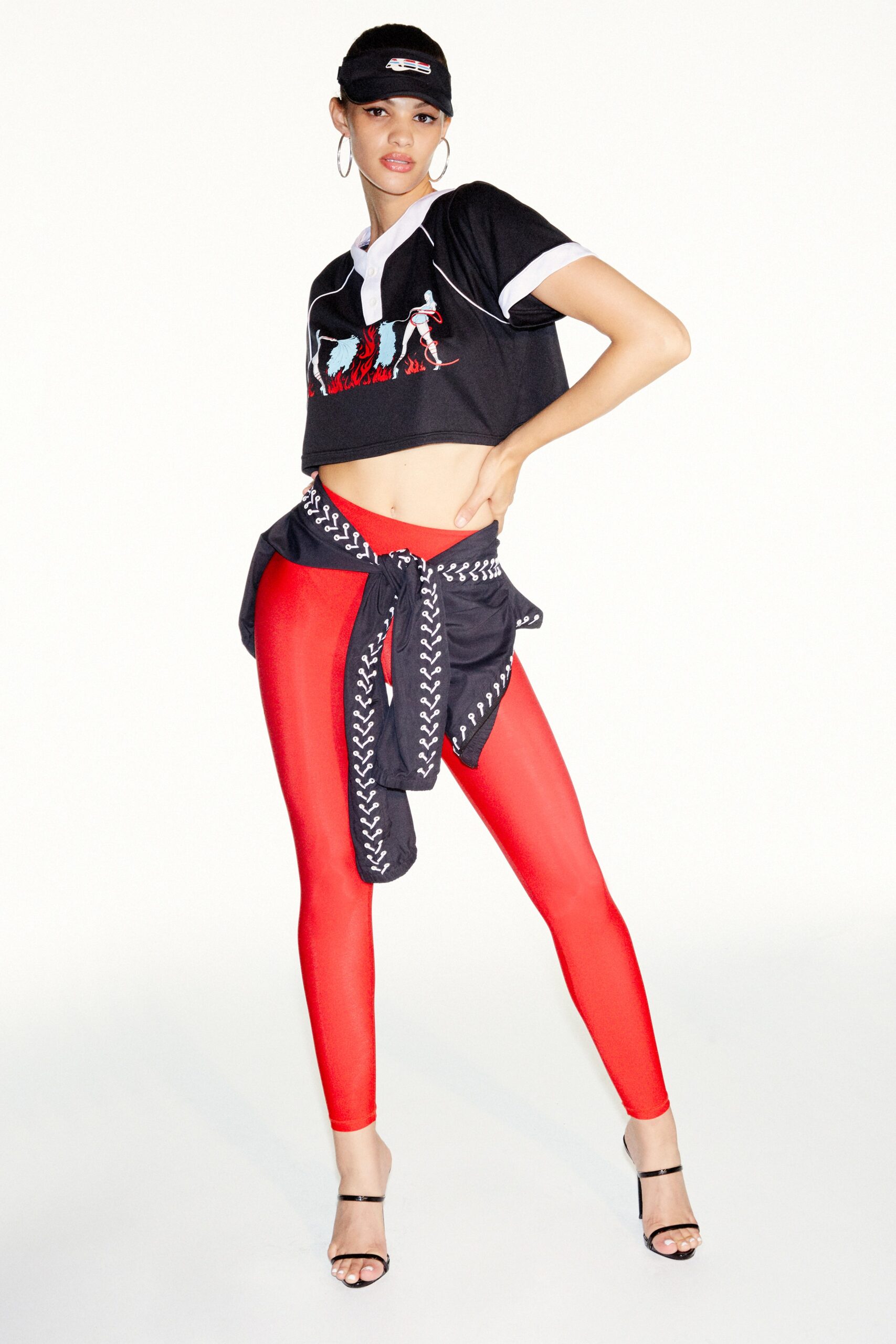 black crop-top and red leggings