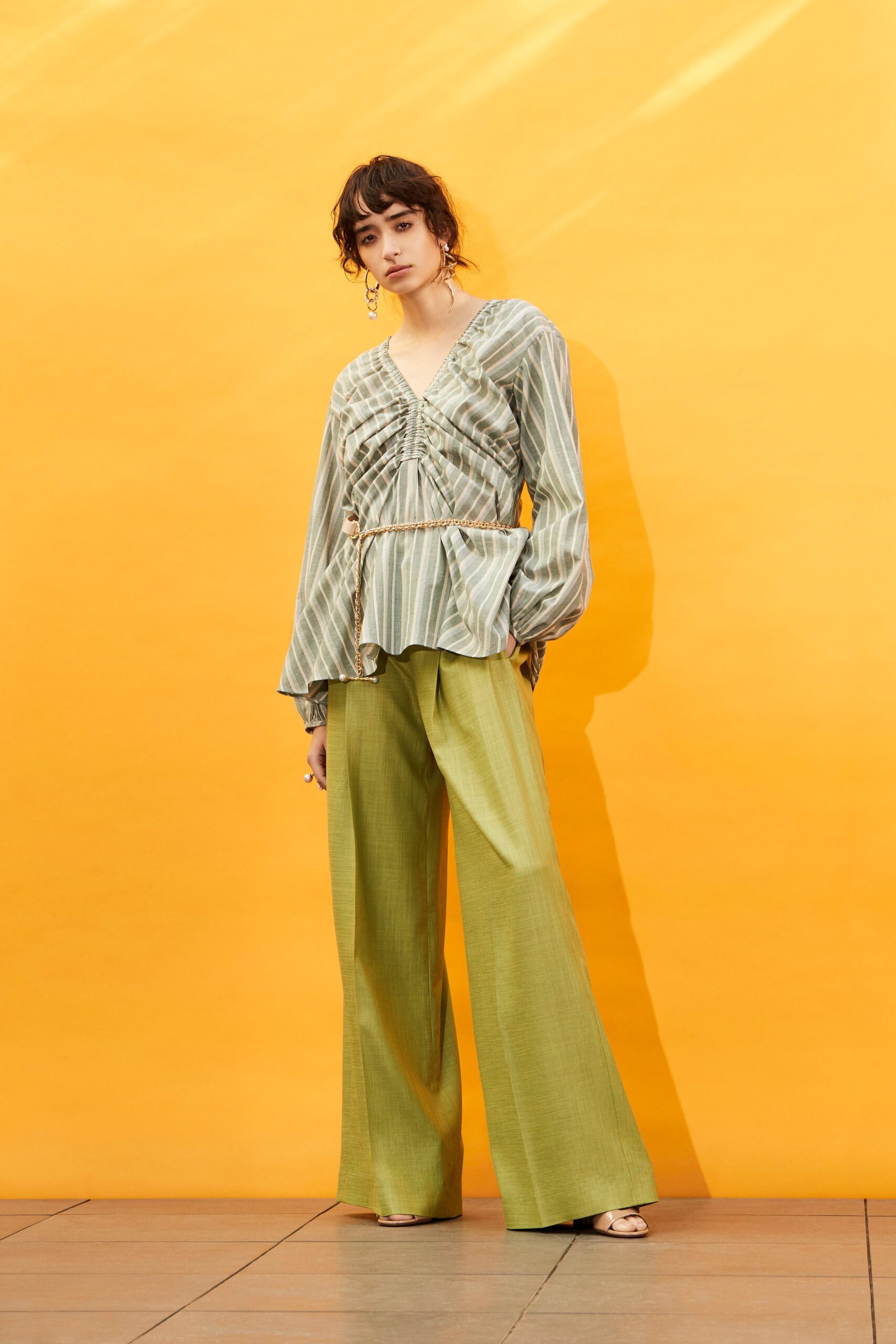 green striped blouse and pants