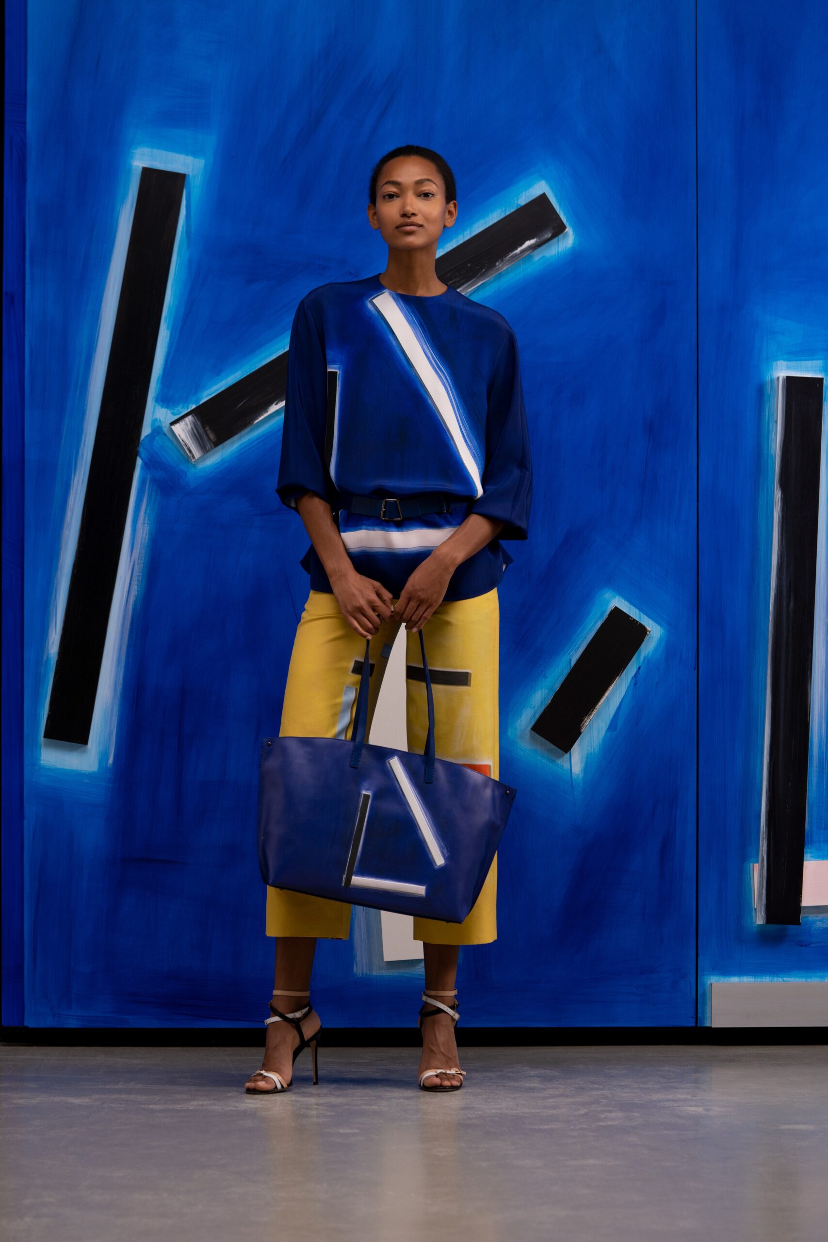 blue color-blocked top with yellow pencil skirt