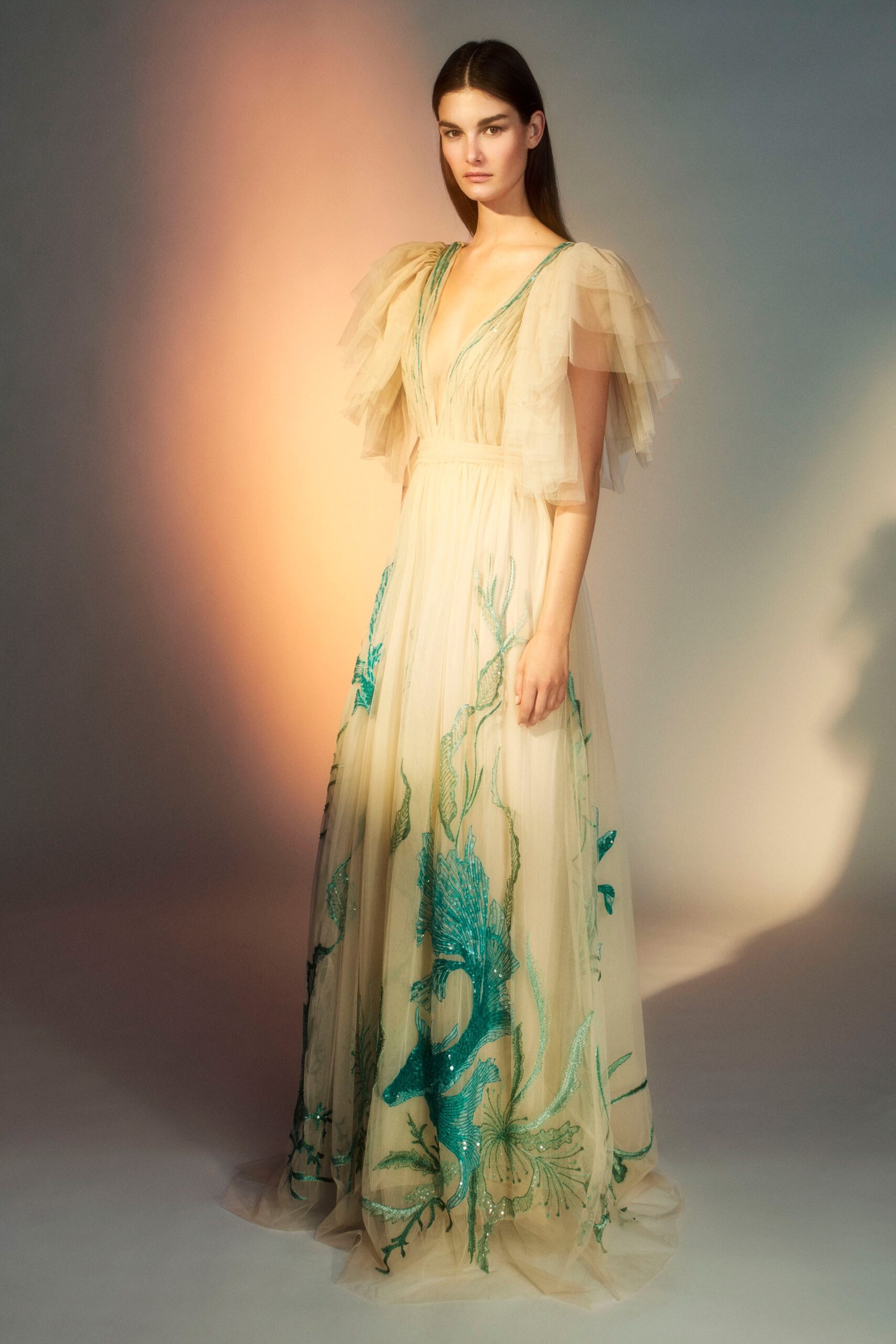 beige embroidered flowing gown