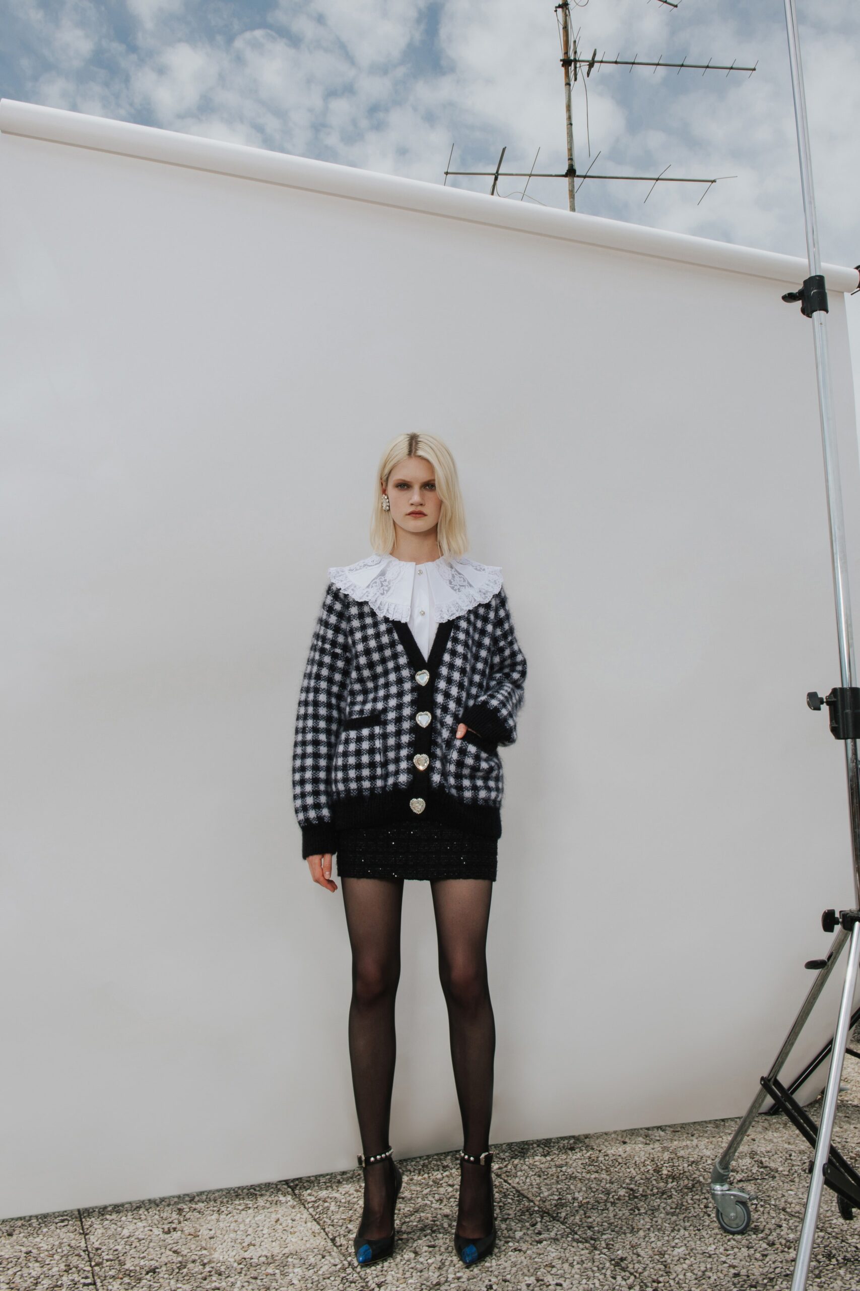 black and white checked cardigan with mini skirt