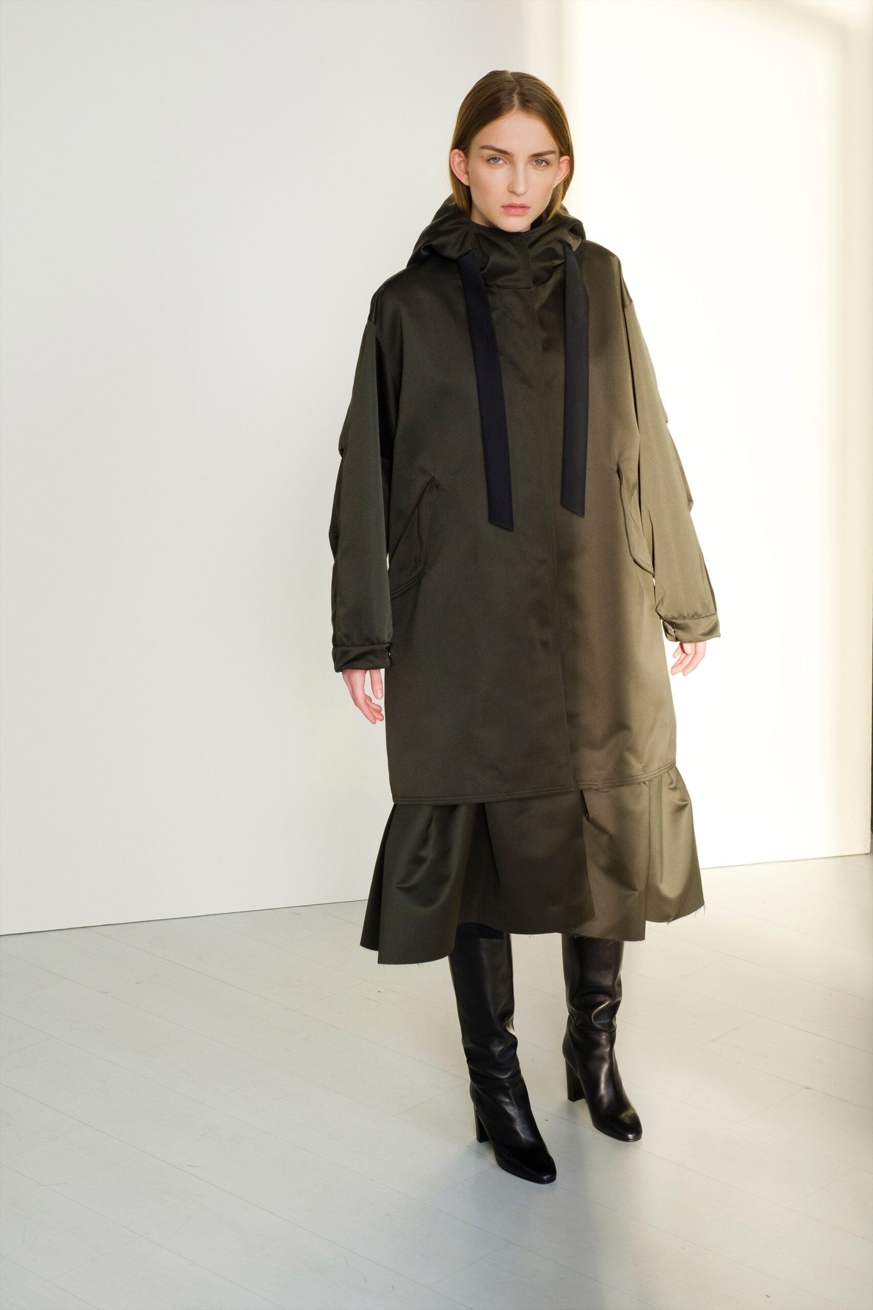 green coat with black dress