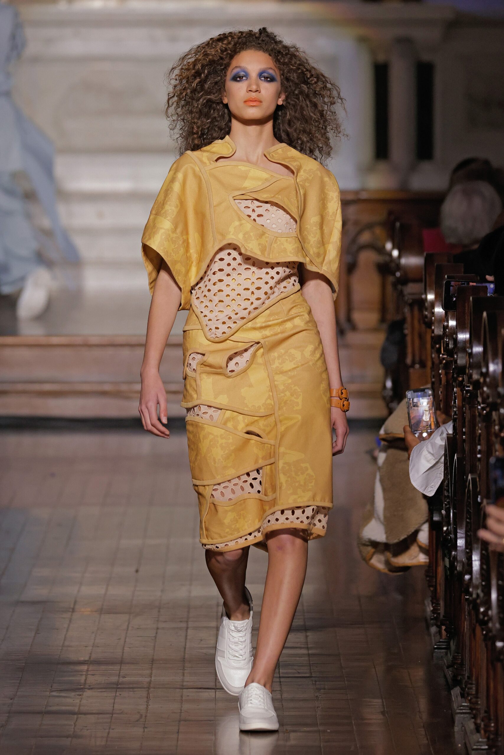 yellow draped midi dress with sneakers