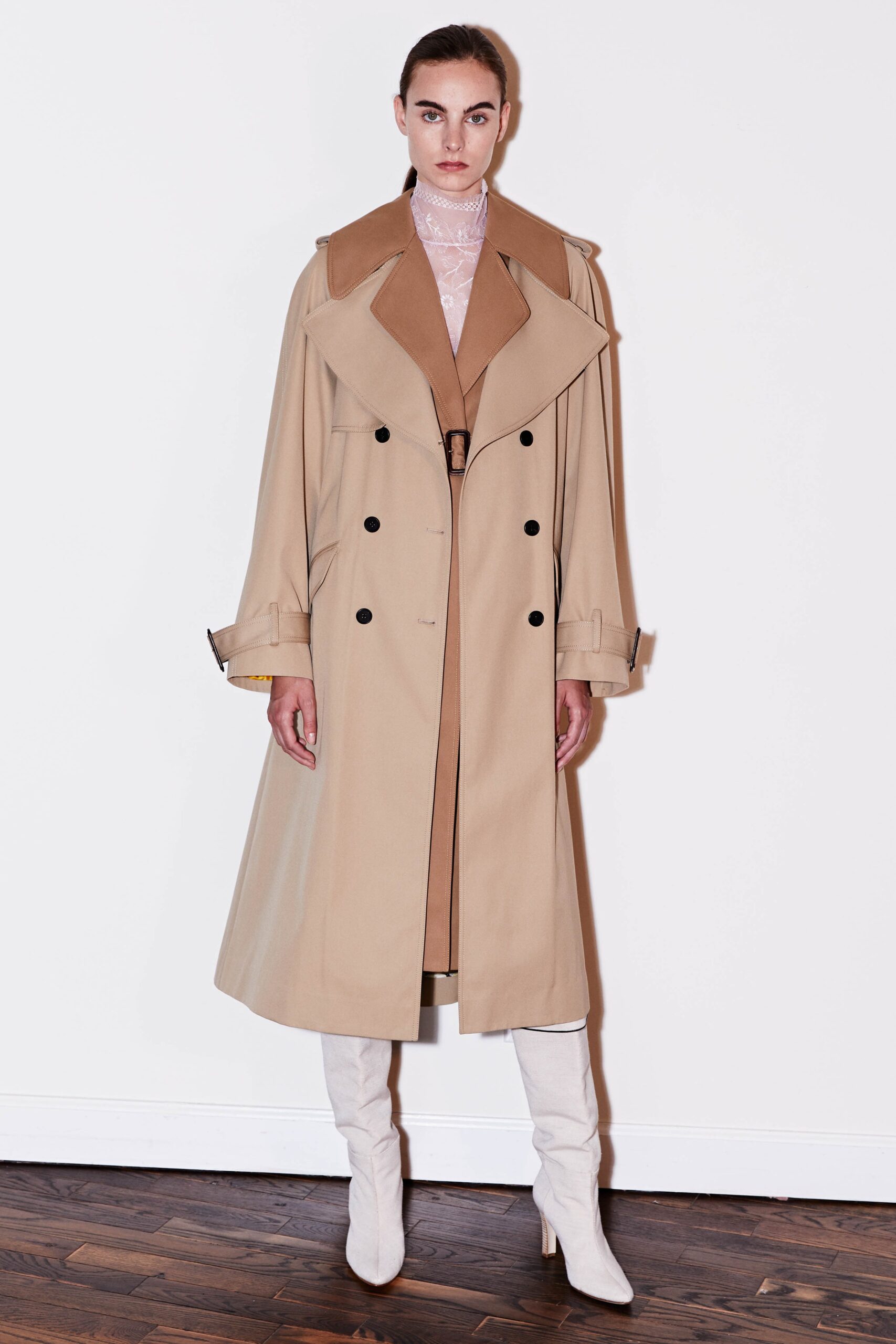 beige trench coat with white blouse