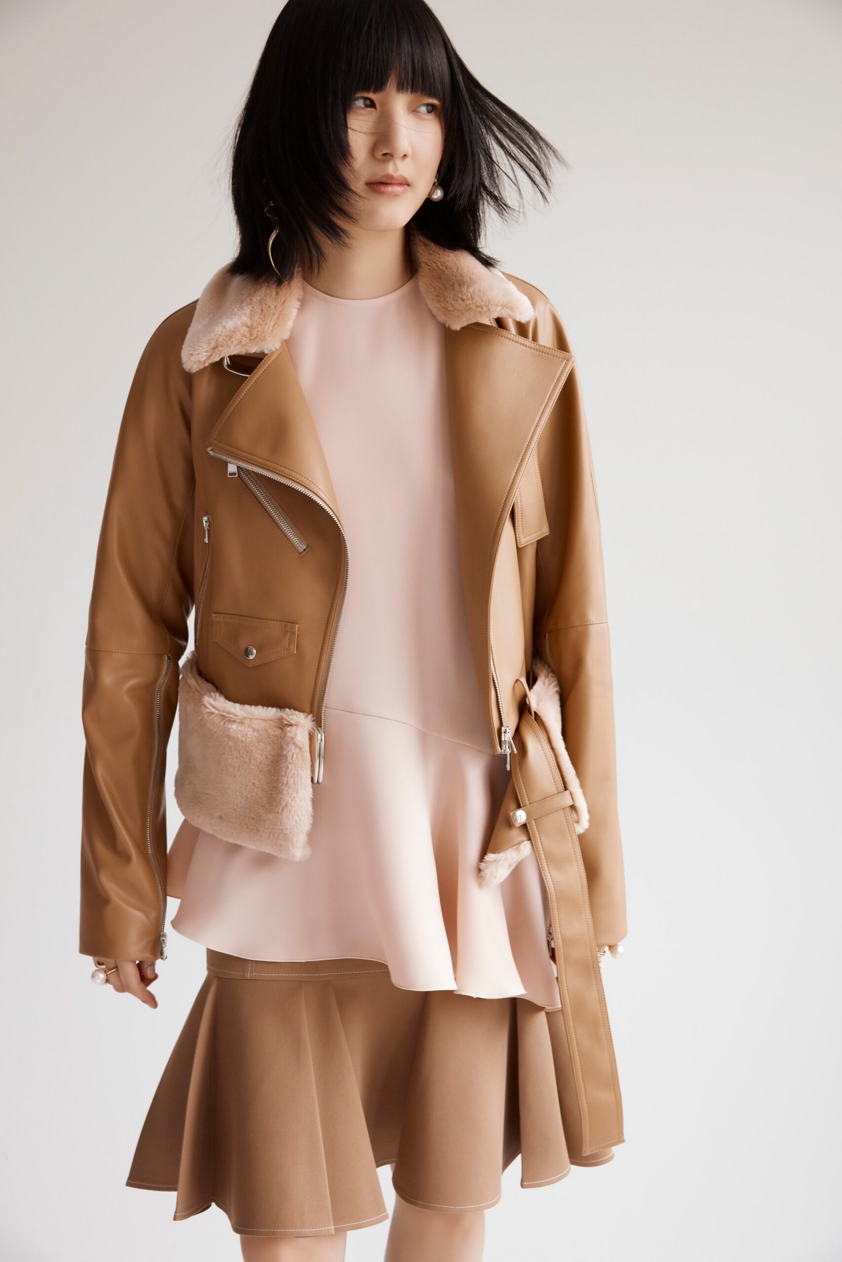 brown leather jacket with pink dress