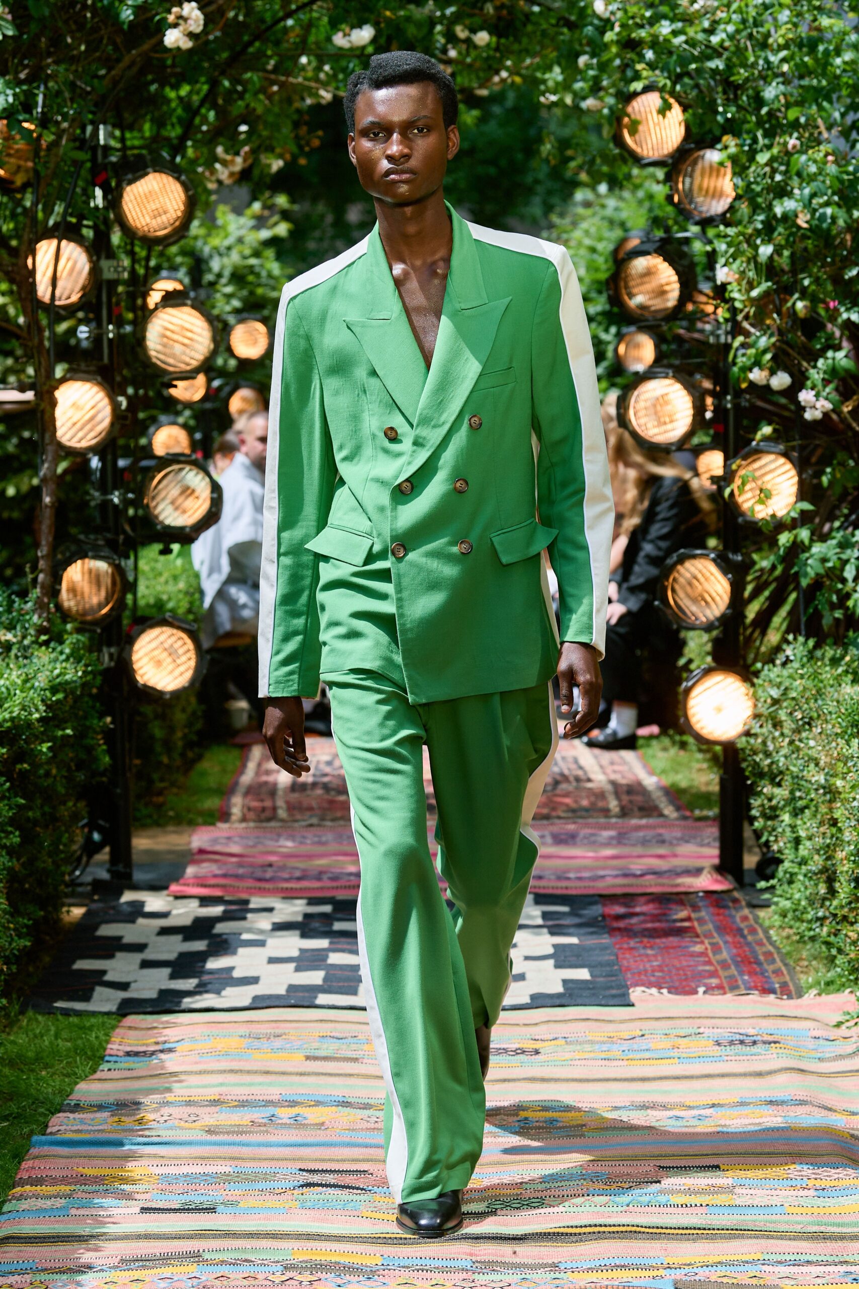 green tailored suit