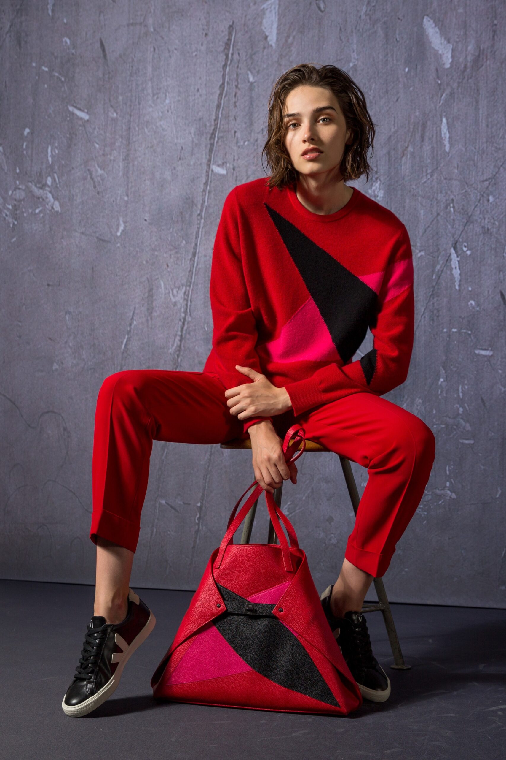 red color-blocked sweater and pants