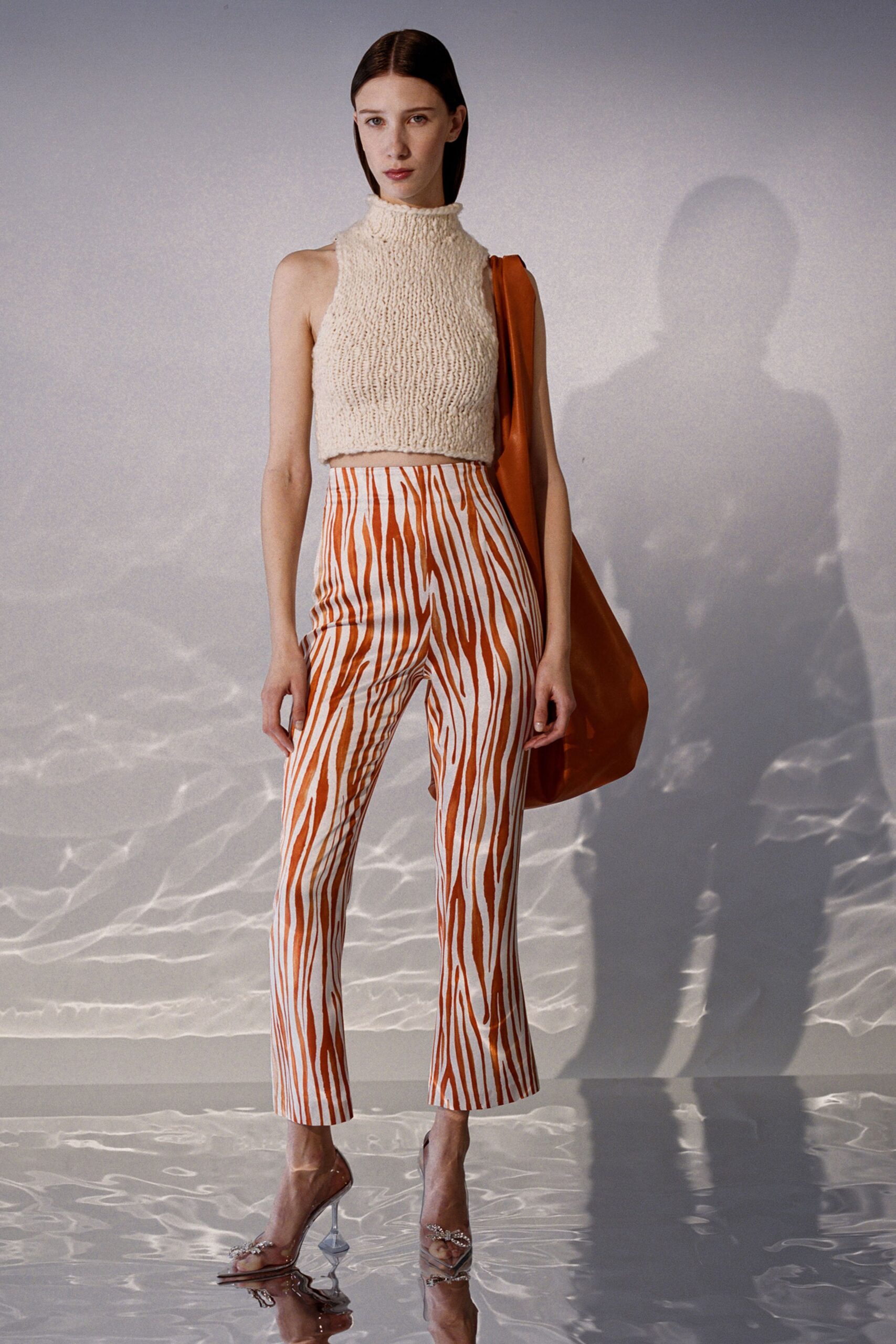 beige knit cropped top and printed pants