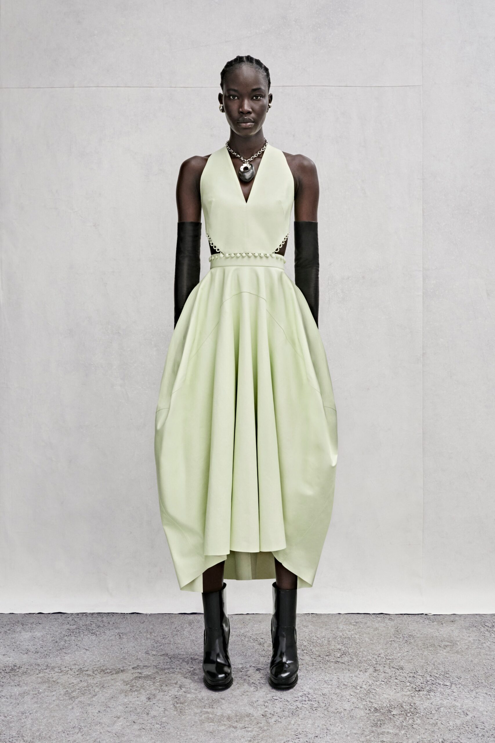 green fitted sleeveless dress