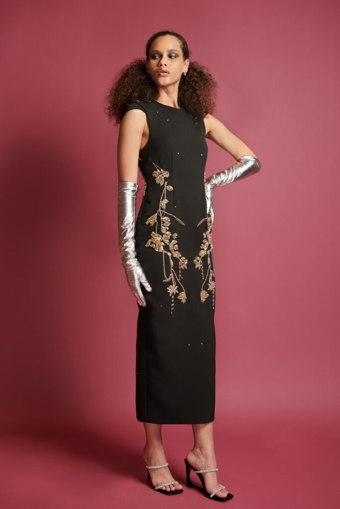 black fitted midi dress with silver gloves