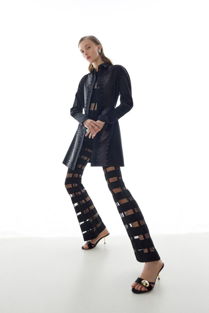 black shirt-dress with cutout pants