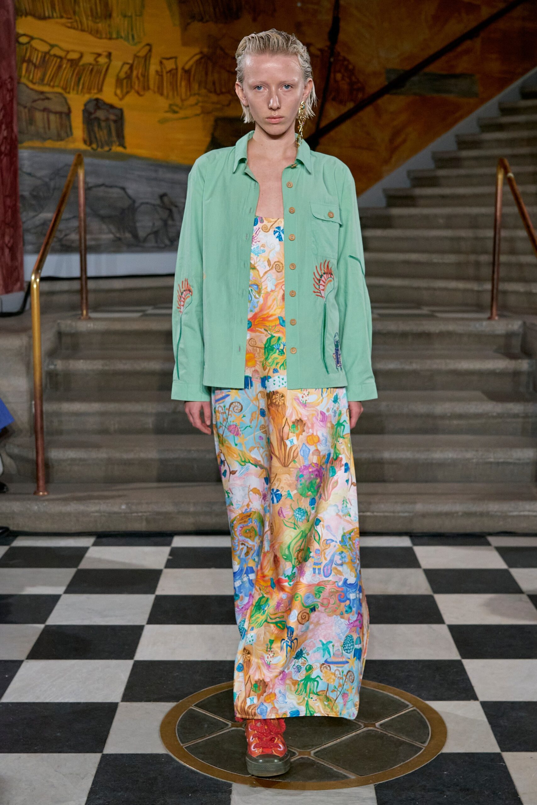 A relaxed multicolor sleeveless dress with a V-neckline and flared silhouette.