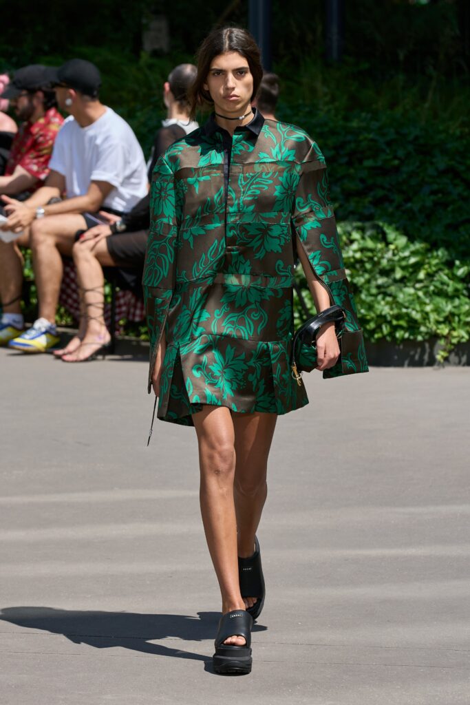 A relaxed green sheer long-sleeve dress with a flared silhouette and collared neckline.