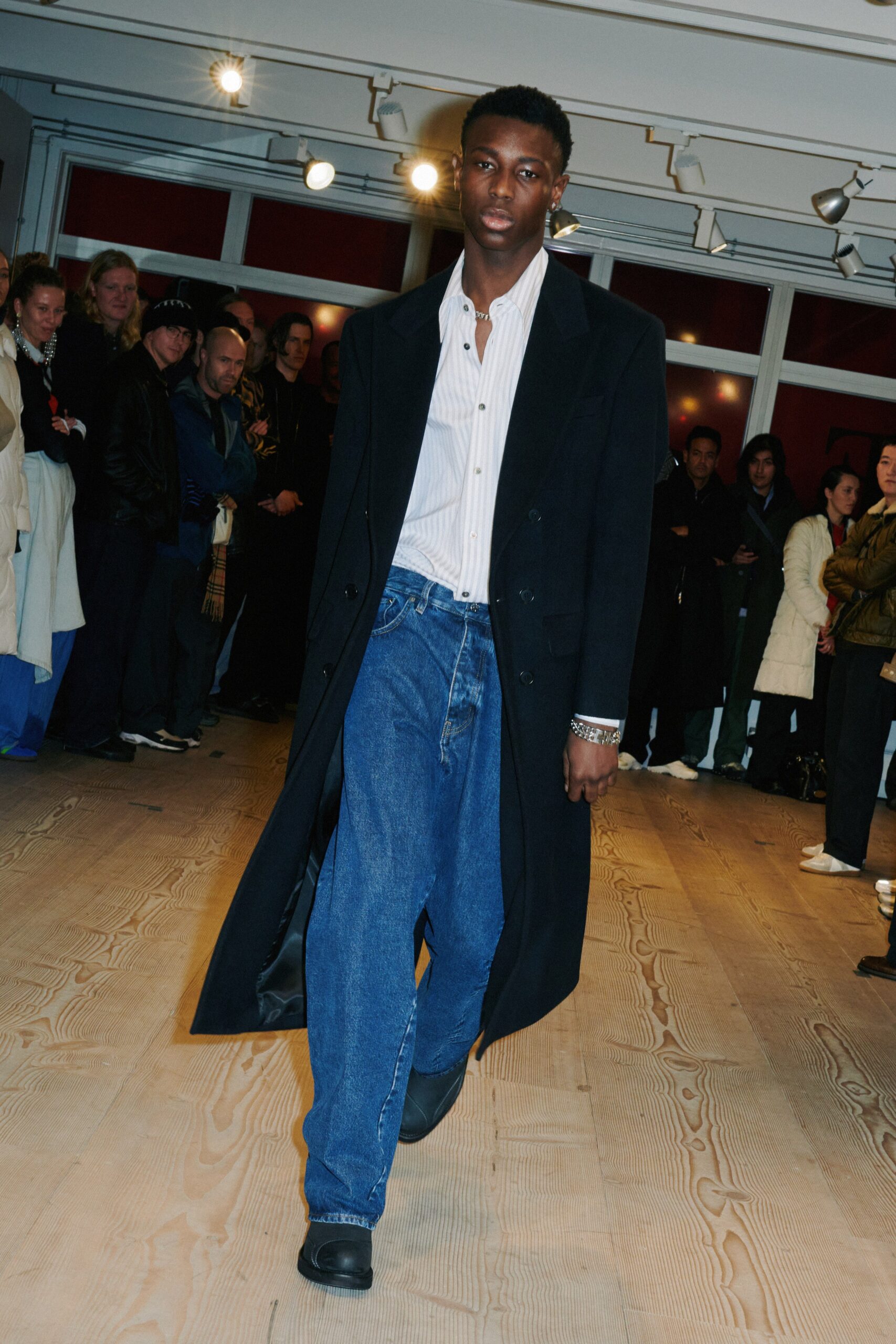 black wool coat with striped shirt