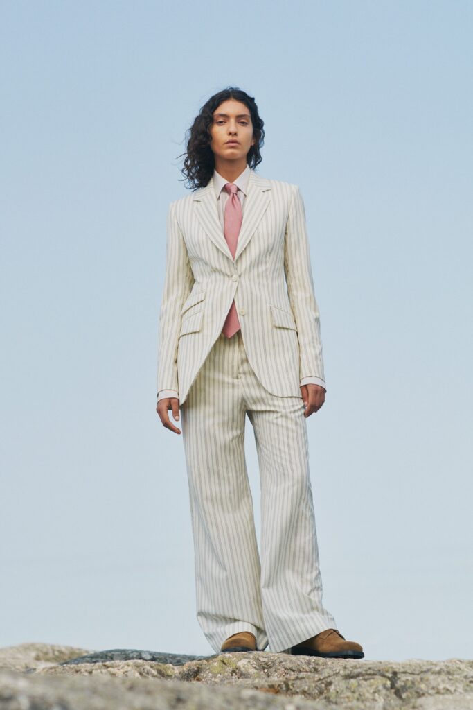 striped tailored suit with pink tie
