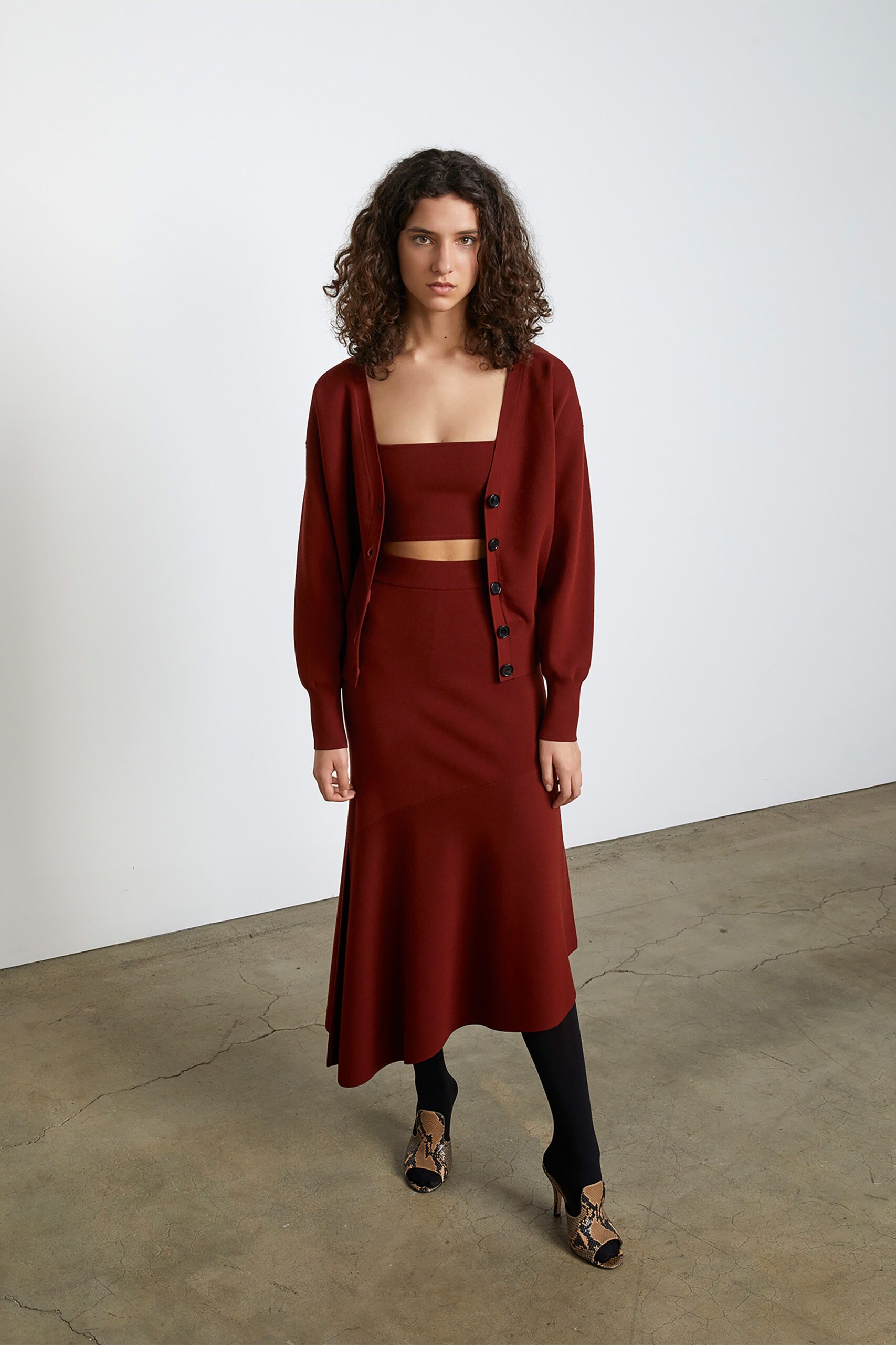 red cotton sleeveless fitted straight-leg top