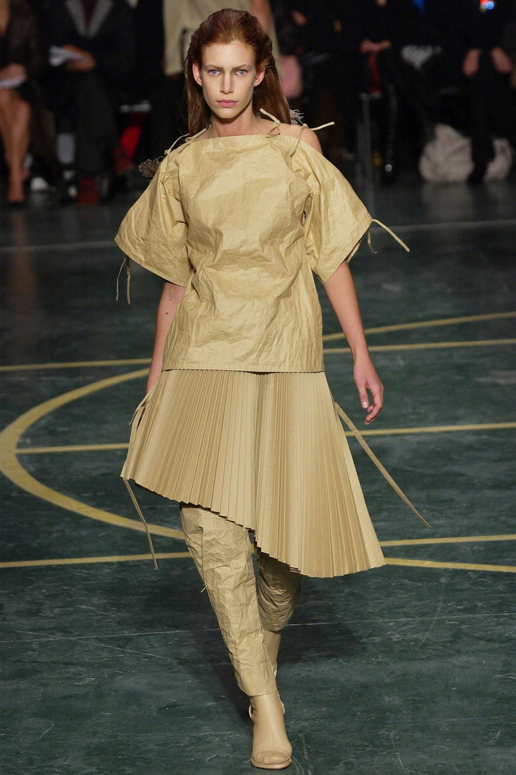 beige pleated midi dress and boots