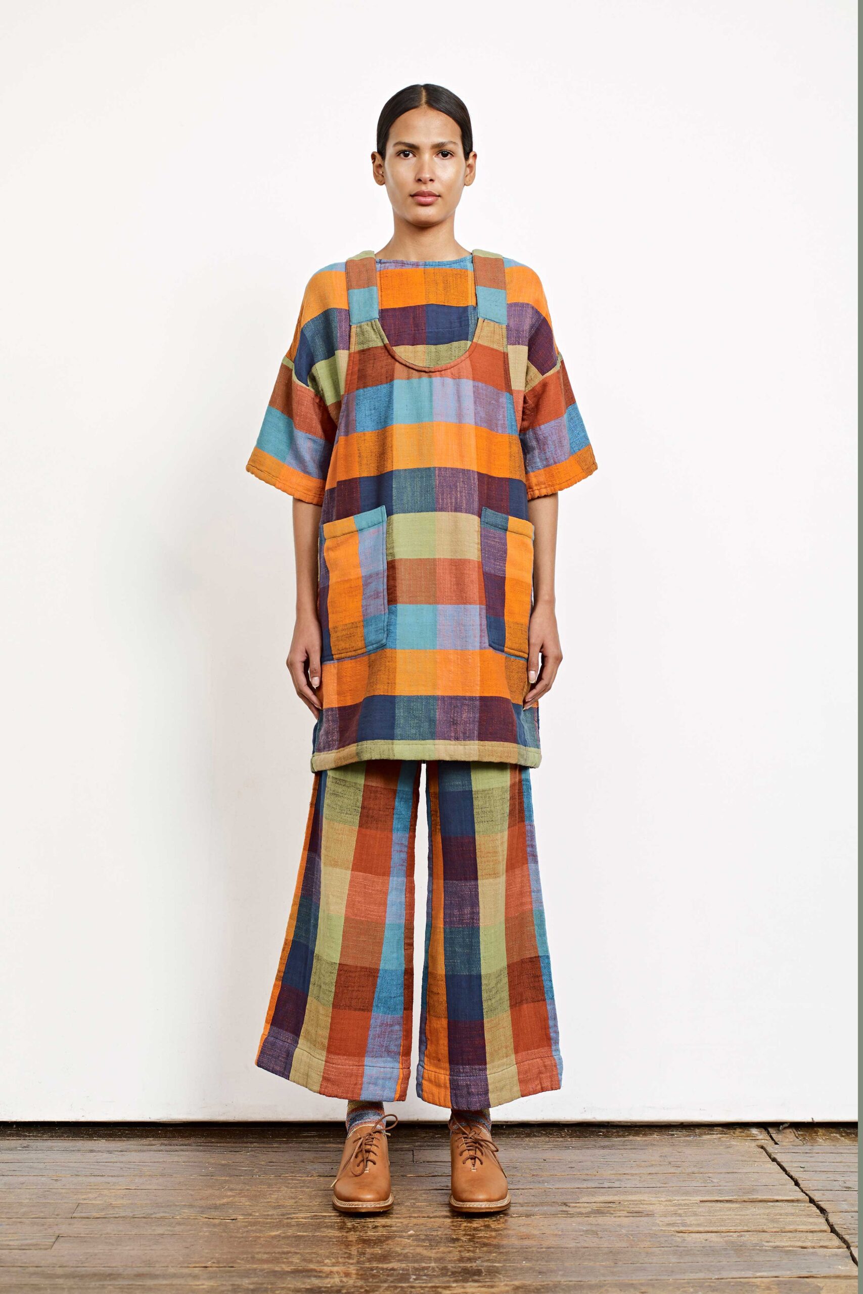 checked orange and blue top and pants