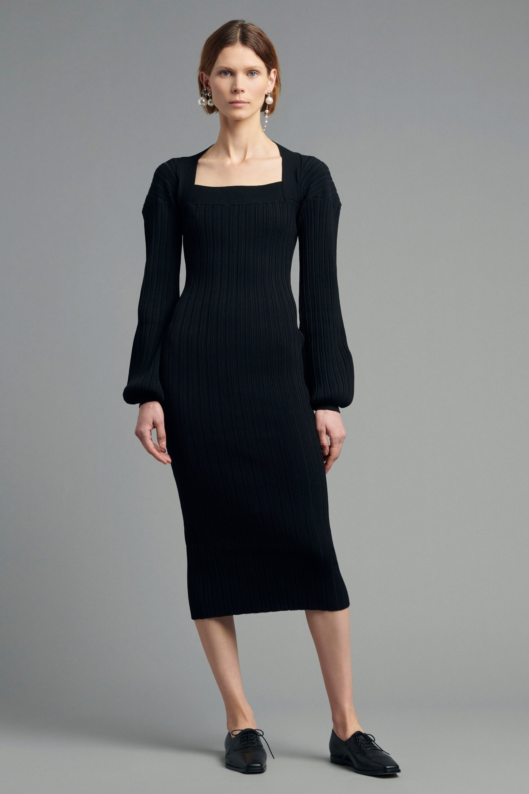 black fitted knit midi dress