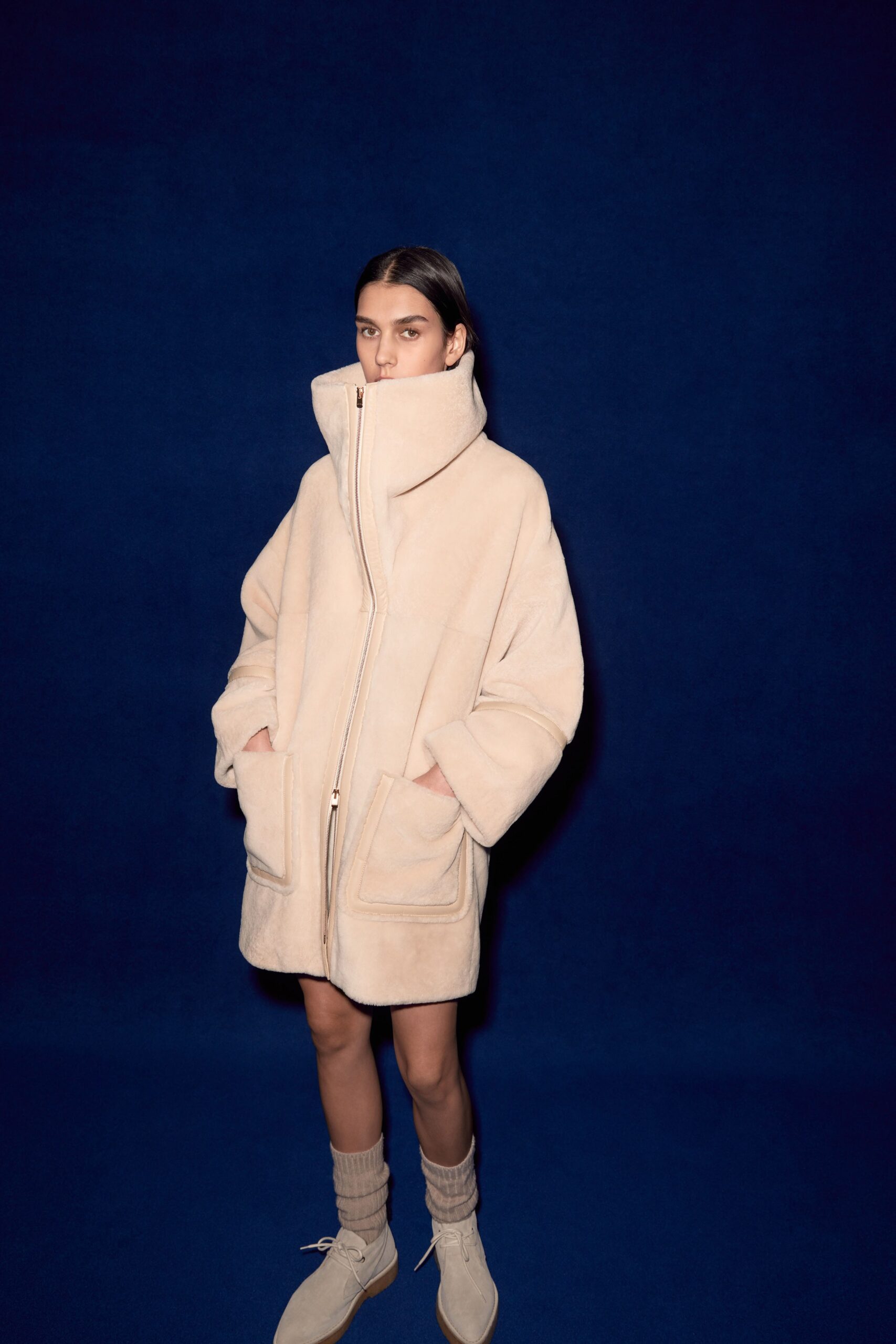 beige oversized faux-fur coat
