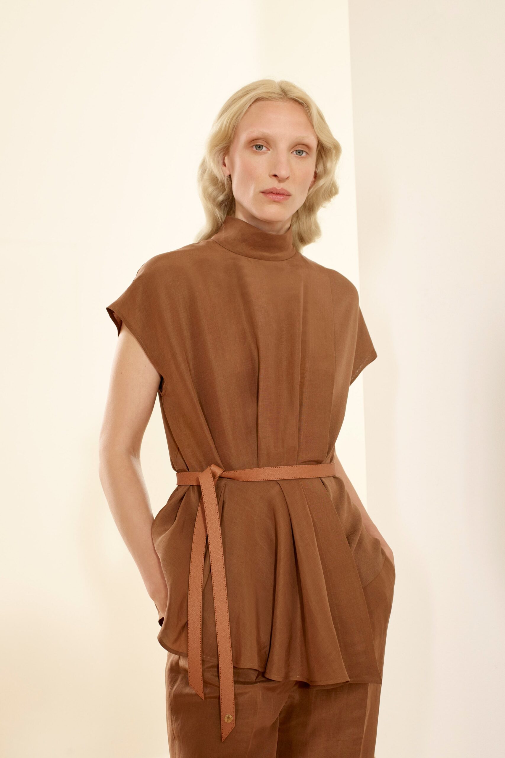 brown cotton short-sleeve high-neck fitted pleated belted top